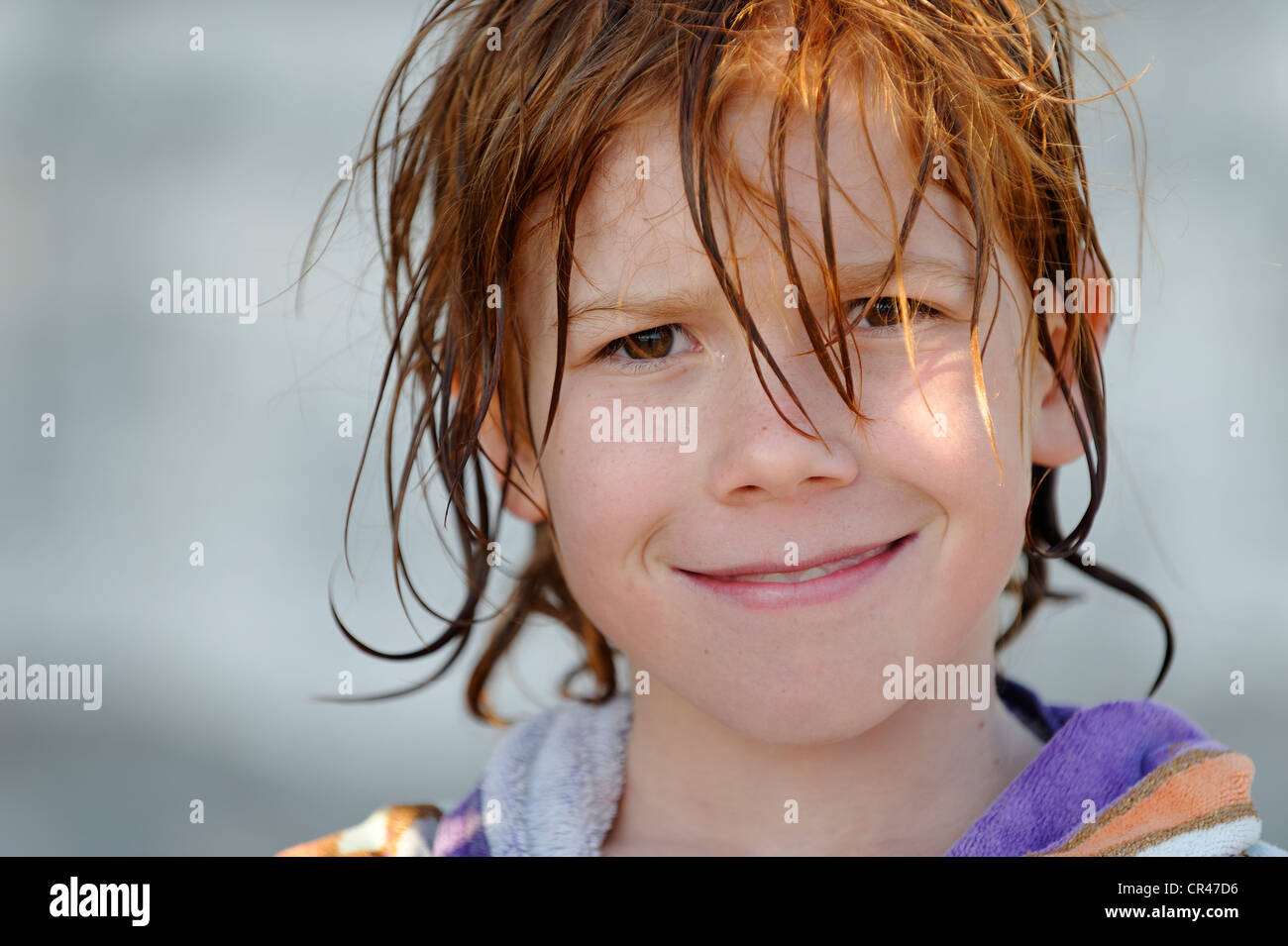 Boy with wet hair after swimming, smiling Stock Photo Alamy