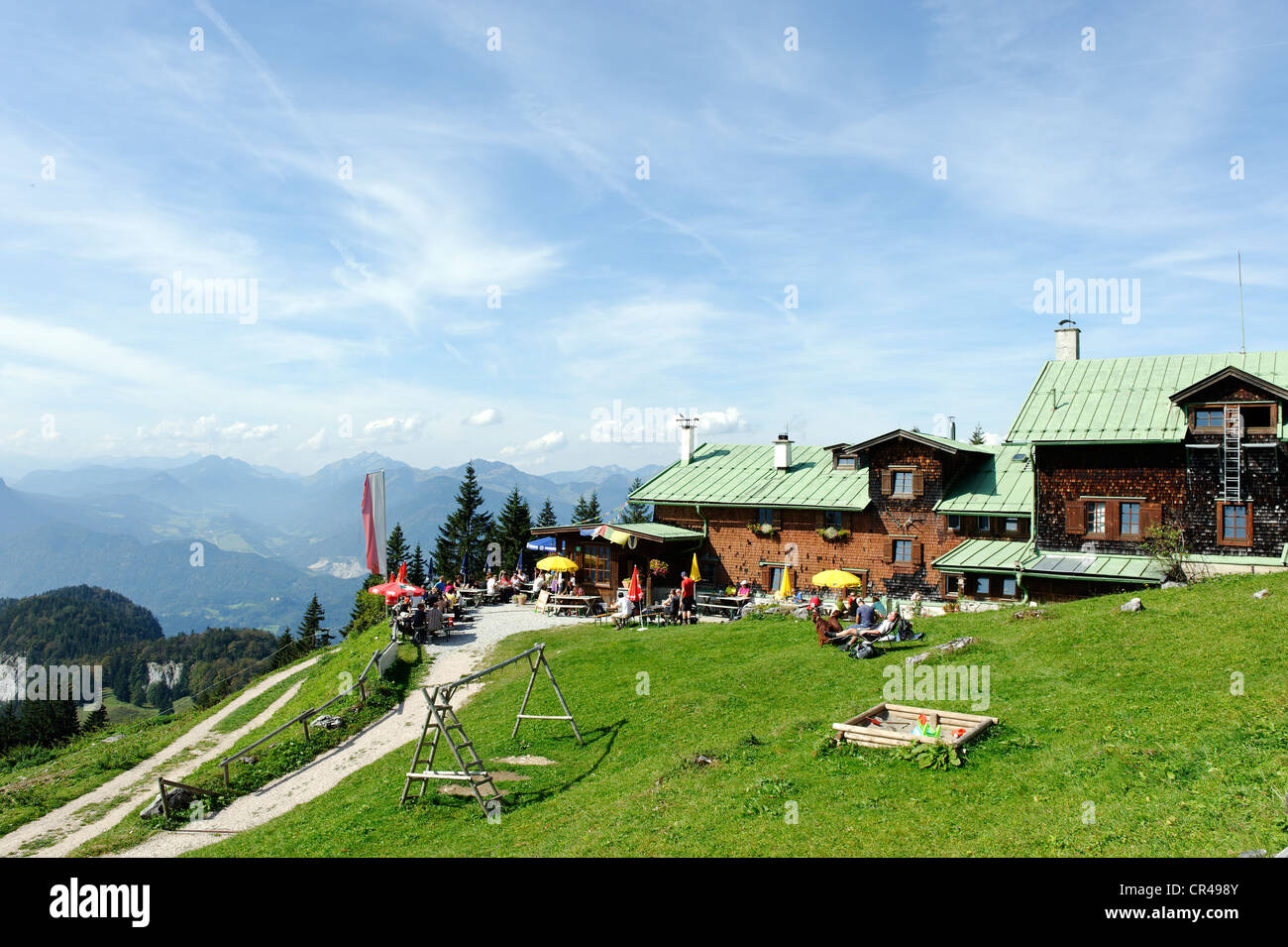 Vorderkaiserfelden-Huette mountain lodge, Mangfall Mountains at the back, Zahmer Kaiser mountain ridge Stock Photo