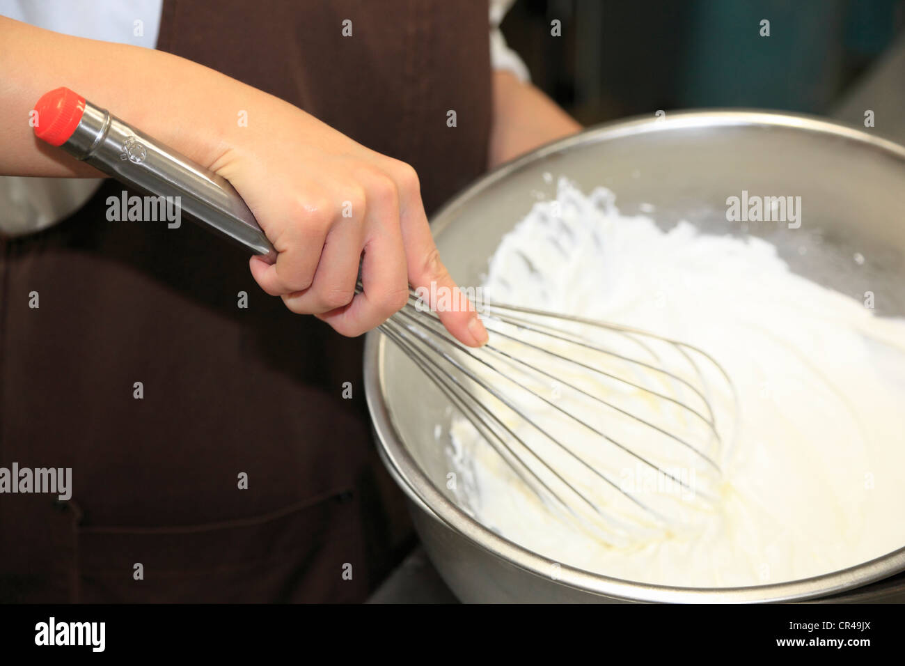 Pastry Chef Beating Whipping Cream Stock Photo