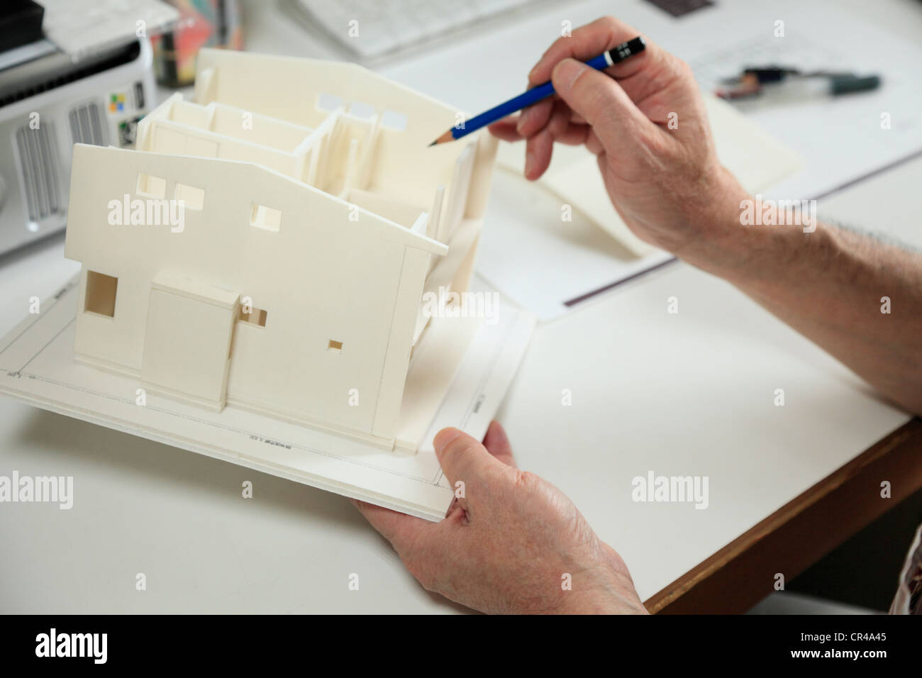 Architect Checking Architectural Model Stock Photo - Alamy