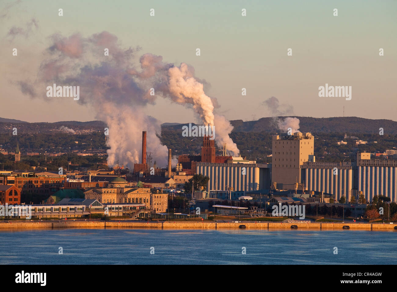 Canada, Quebec Province, Quebec City, the port, Bunge Cereal Terminal and papermaking factory in St Lawrence River banks Stock Photo