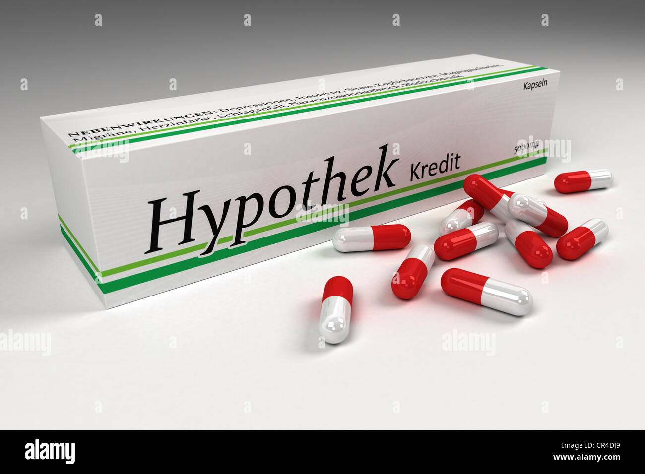 Tablets box with the lettering 'Hypothek Kredit', German for 'mortgage, loans', with capsules, symbolic image for mortgages Stock Photo