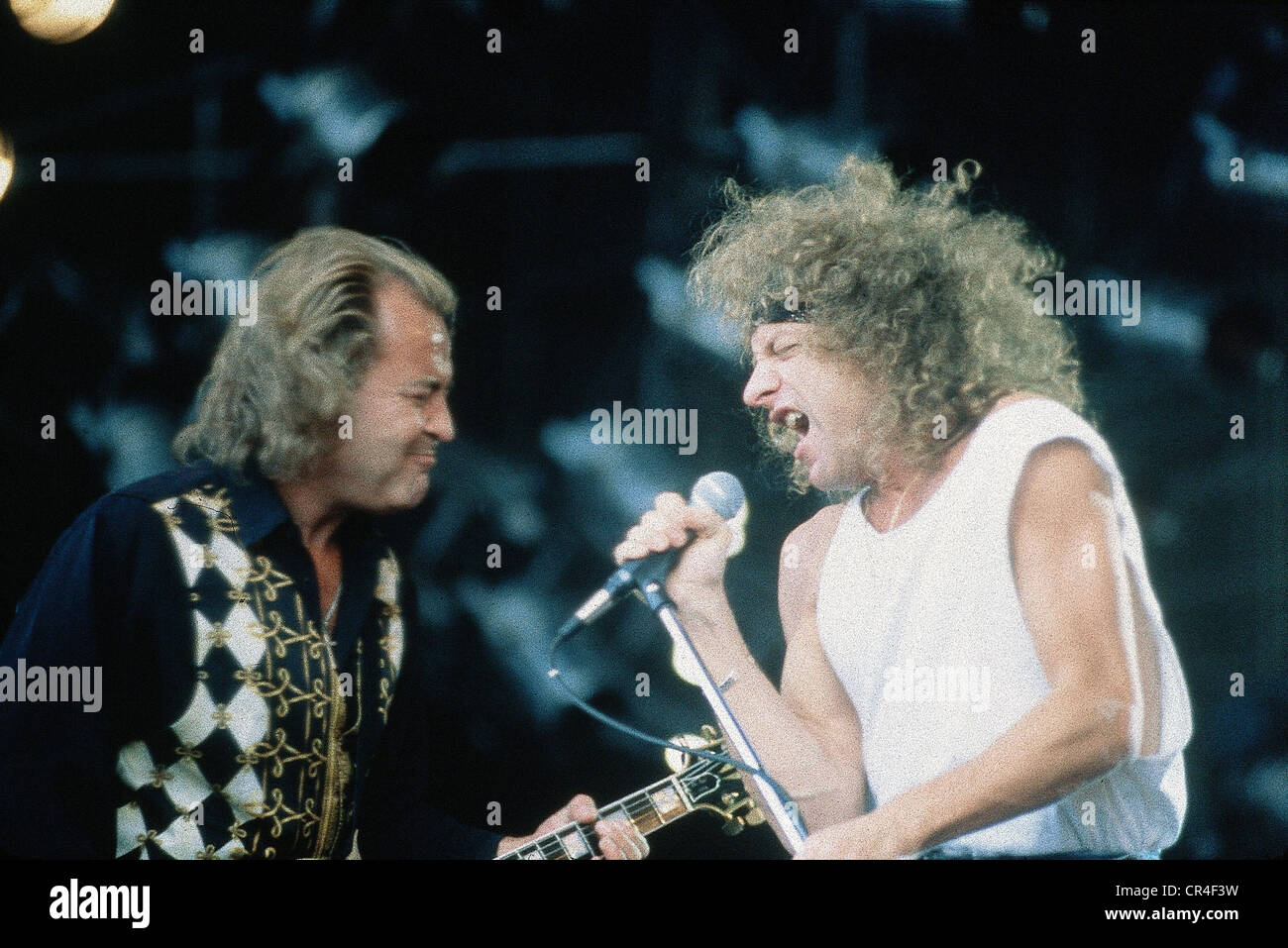 Foreigner, US rock band, formed in 1976, singer Mick Jones on stage, circa 1992 Stock Photo Alamy