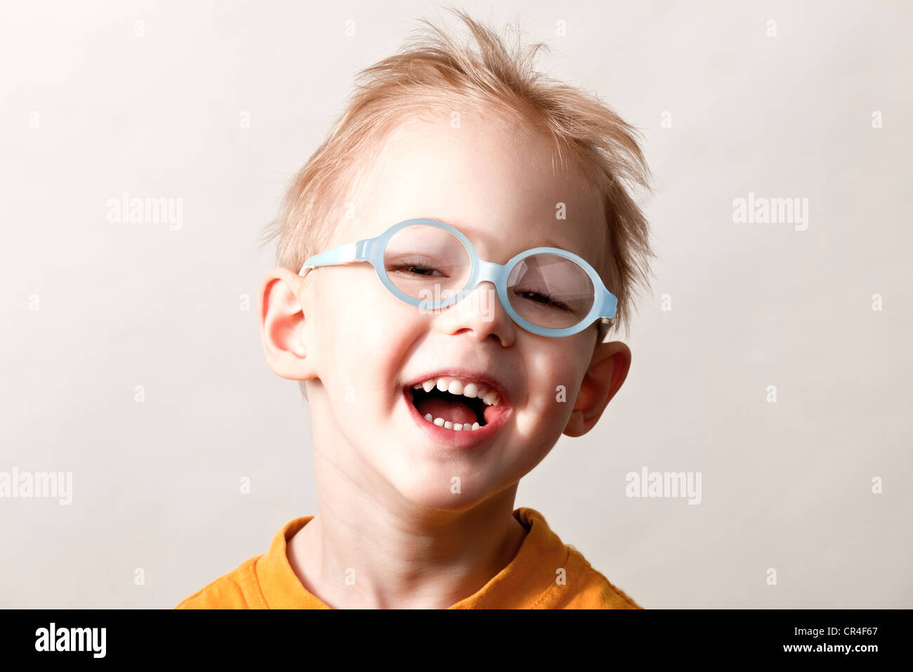 little boy with glasses