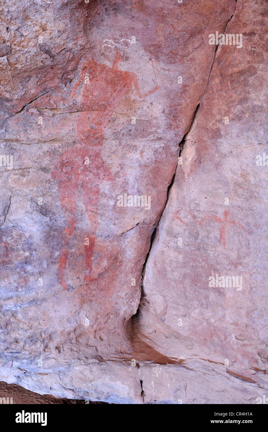 Lifesize painting of a man, neolithic rock art in the Tadrart, Tassili ...