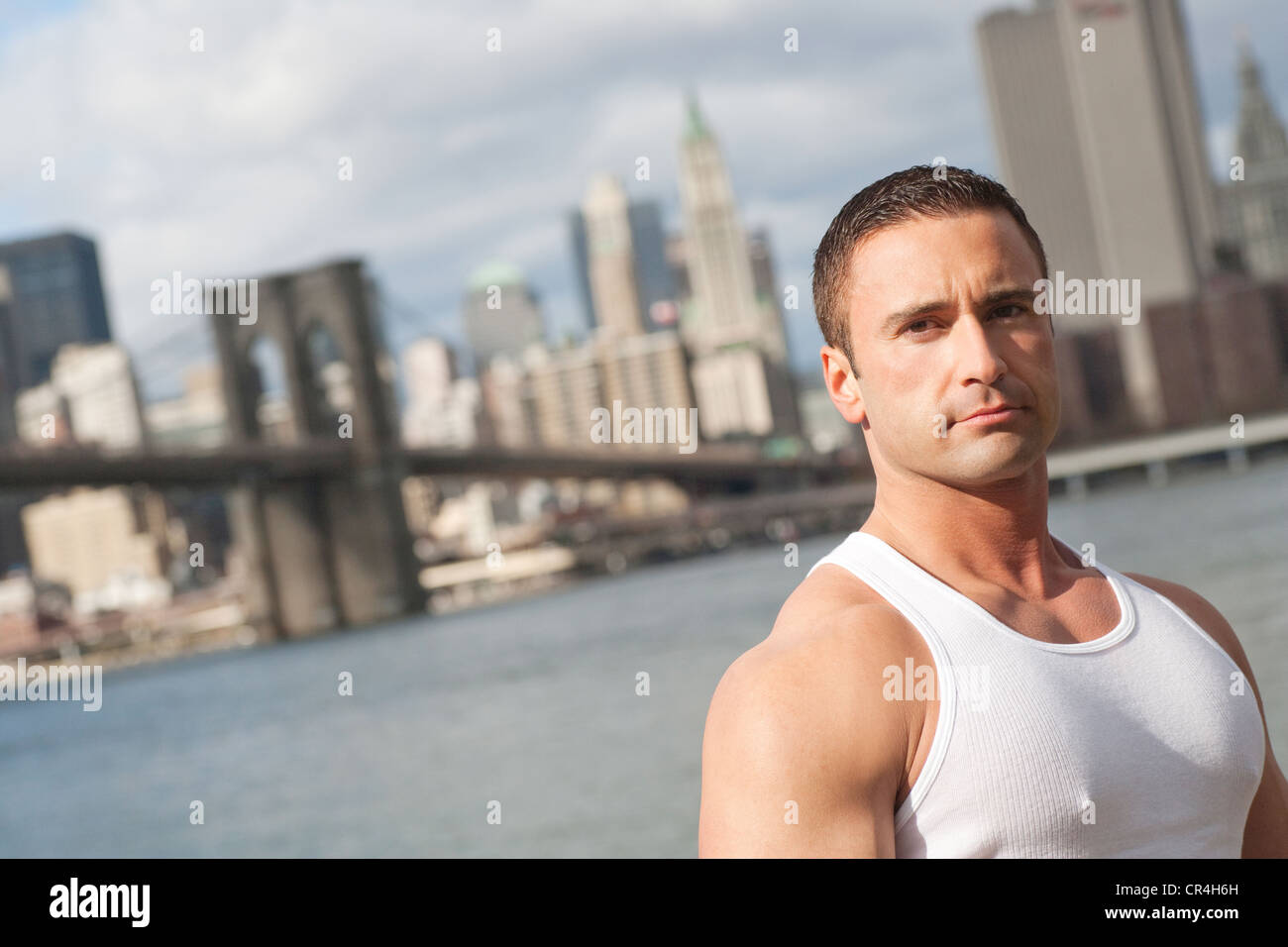 Portrait of fit and healthy looking Caucasian man singlet in New York City Stock Photo