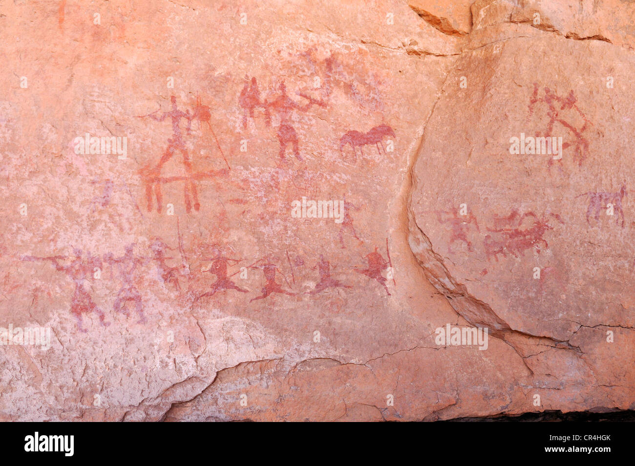 Painted people, neolithic rockart of the Acacus Mountains or Tadrart Acacus range, Tassili n'Ajjer National Park Stock Photo