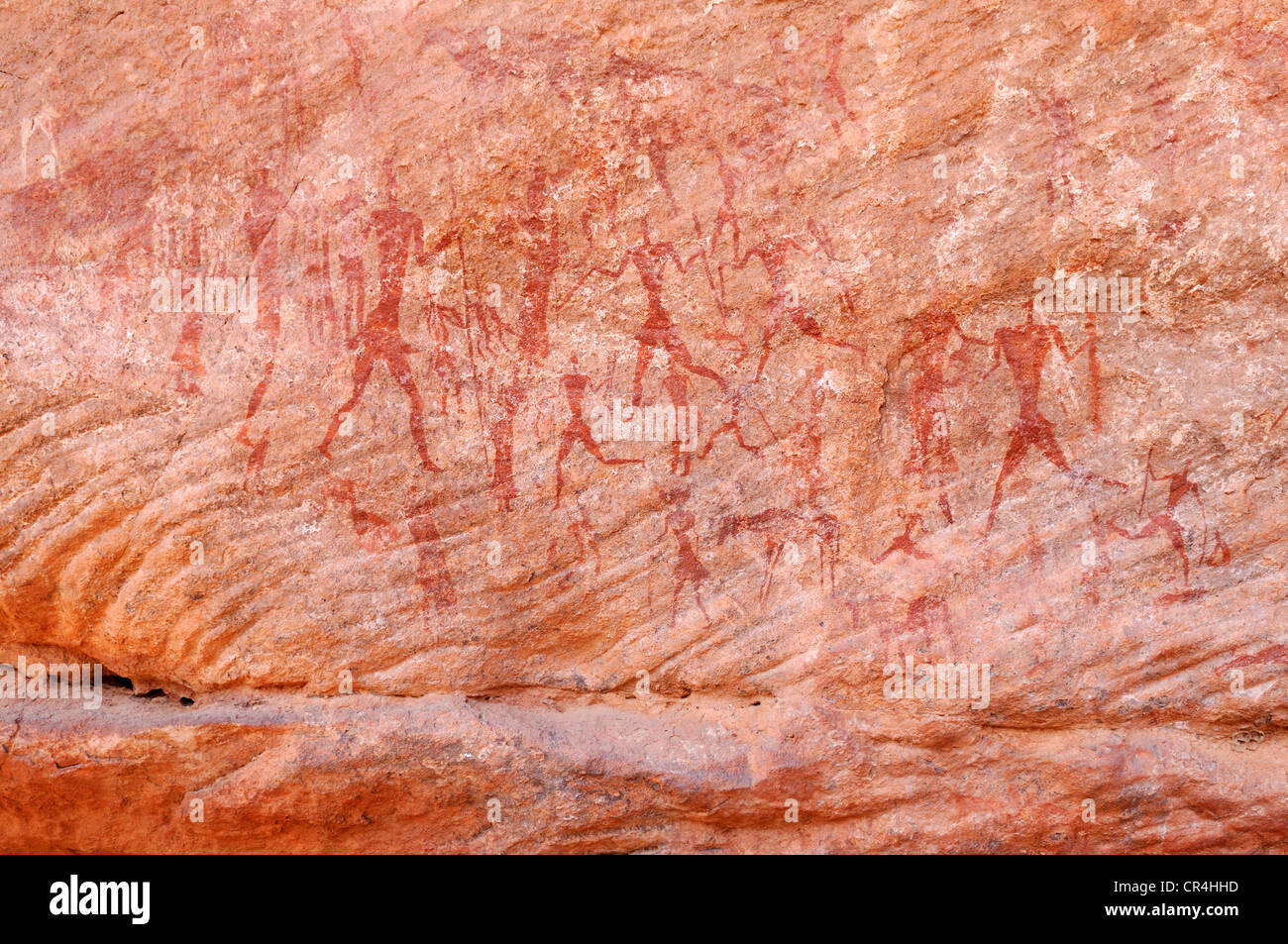 Painted people, neolithic rockart of the Acacus Mountains or Tadrart Acacus range, Tassili n'Ajjer National Park Stock Photo