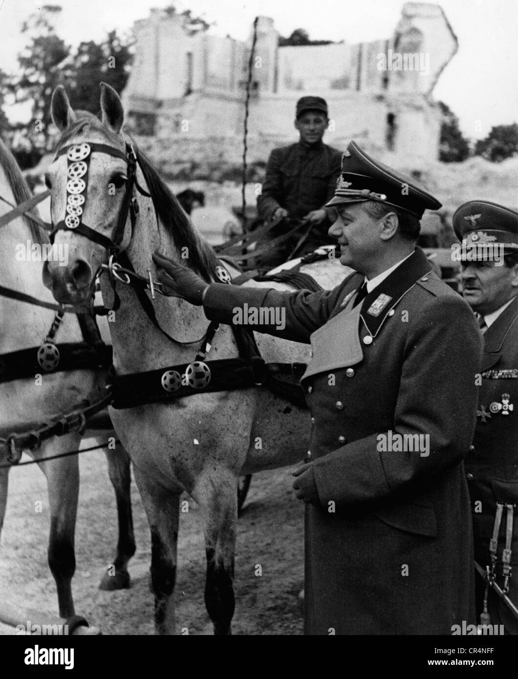 Rosenberg, Alfred, 13.1.1893 - 16.10.1946, German politician (NSDAP), Reich Minister for the Occupied Eastern Territories 1941 - 1945, visiting a stud farm in the Ukraine, right: Reichskommissar of Ukraine Erich Koch, Stock Photo