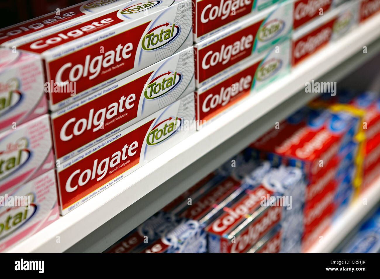 Colgate total toothpaste pictured on a supermarket shelf. Manufactured