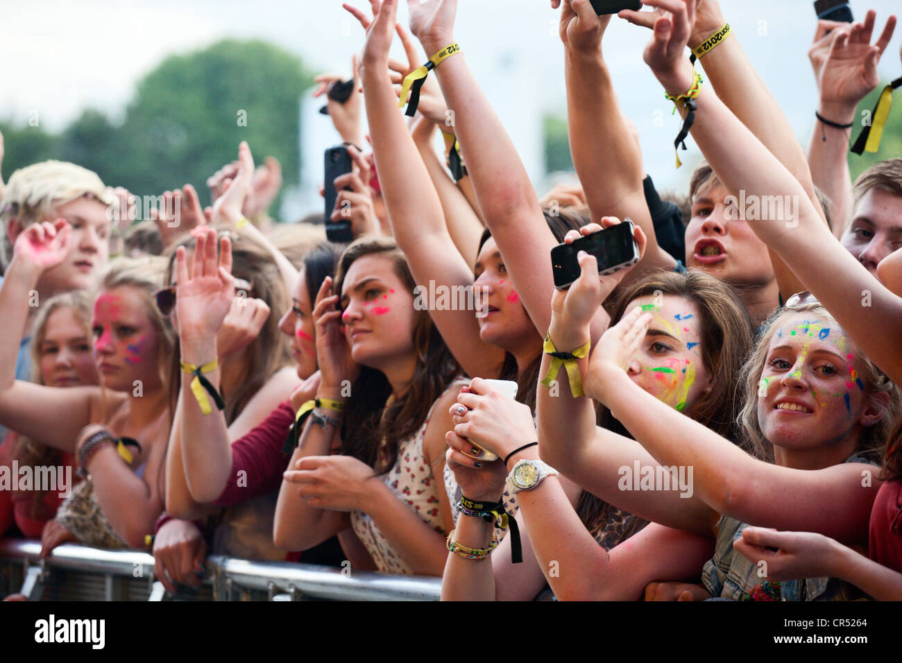 Painted Faces in the Front Row during Rizzle Kicks at Evolution Festival 2012 at Spillers Wharf in Newcastle upon Tyne UK Stock Photo