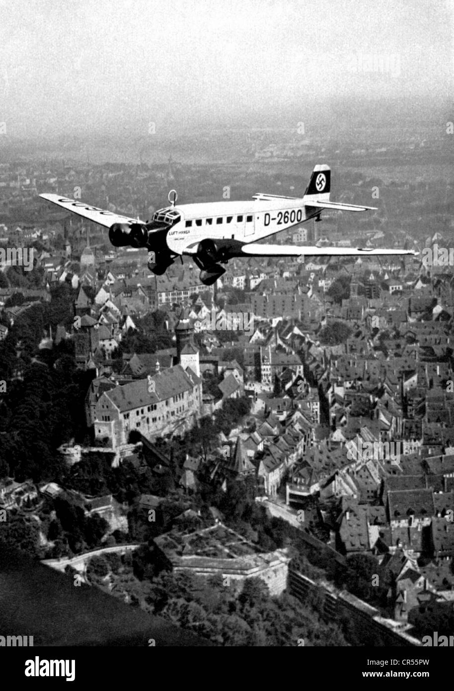 Hitler, Adolf, 20.4.1889 - 30.4.1945, German politician (NSDAP), Fuehrer and Reich Chancellor since 1933, his aircraft Junkers Ju 52, identification number D-2600, on the way to the Nuremberg Rally 1934, Stock Photo