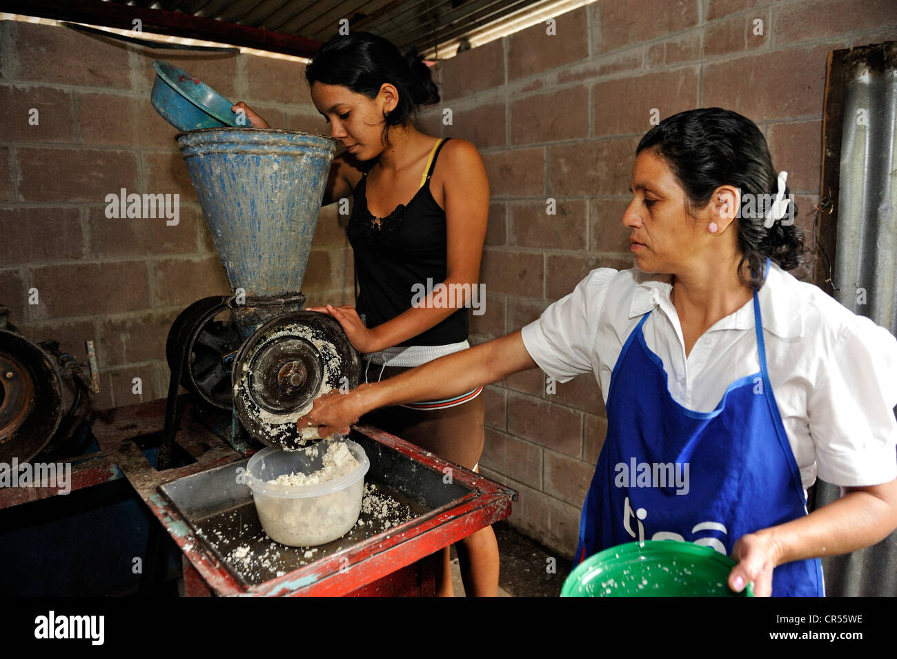 Corn is ground to prepare a traditional tortilla, community of Cerro Verde, El Salvador, Central America, Latin America Stock Photo