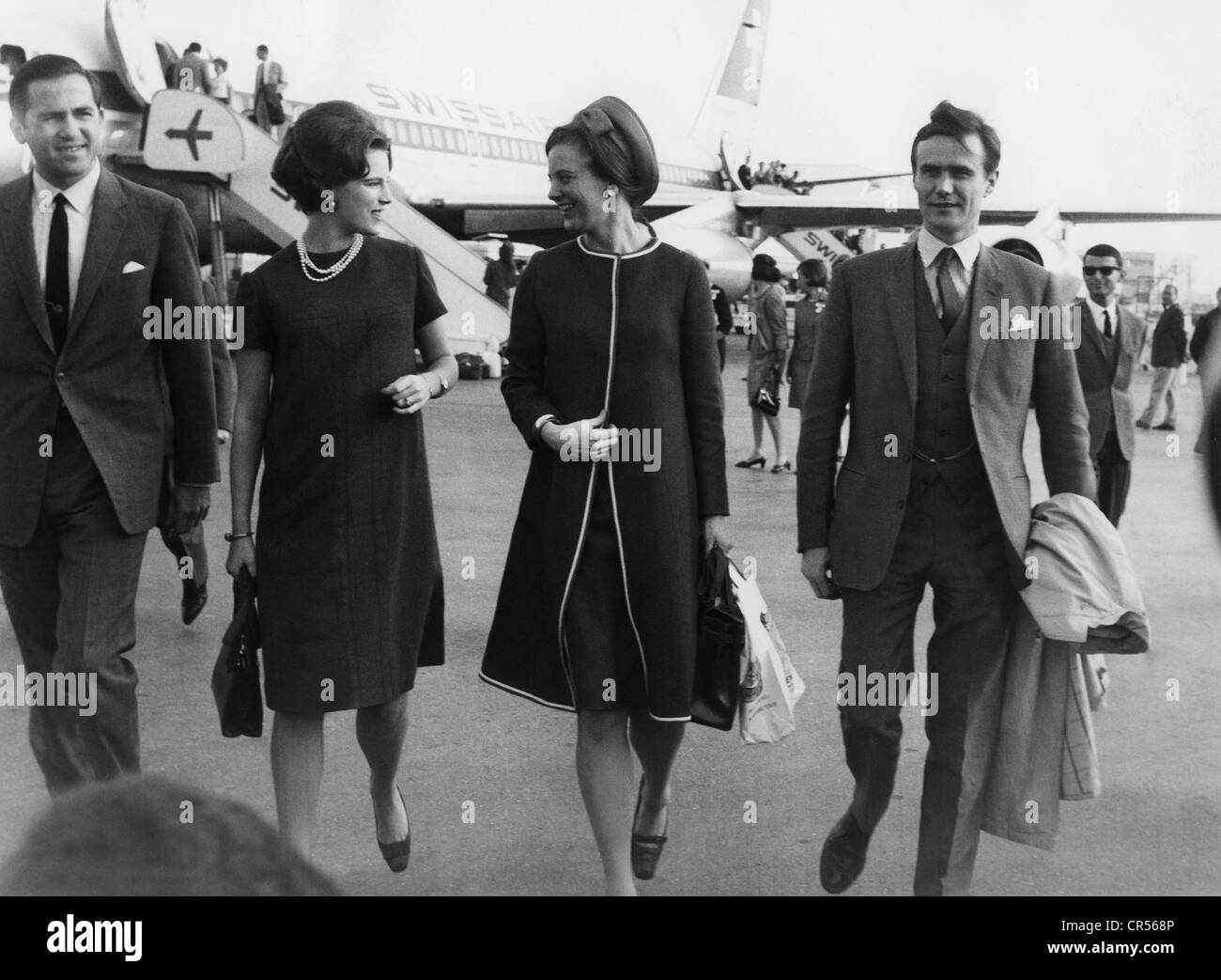 Margrethe II, * 16.4.1940, Queen of Denmark since 14.1.1972, with her fiance Count Henri de Laborde de Monpezat, King Constantine II of Greece and Queen Anne-Marie of Greece, arrival at the airport, Athens, April 1967, half length, Stock Photo
