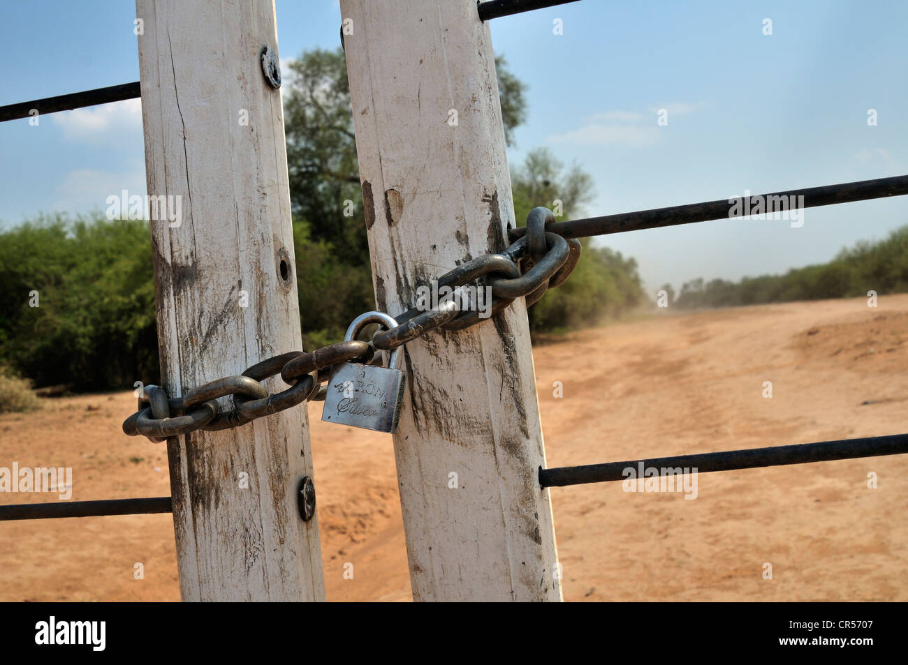 Locked gate, property owned by a big landowner, Gran Chaco region, Salta province, Argentina, South America Stock Photo