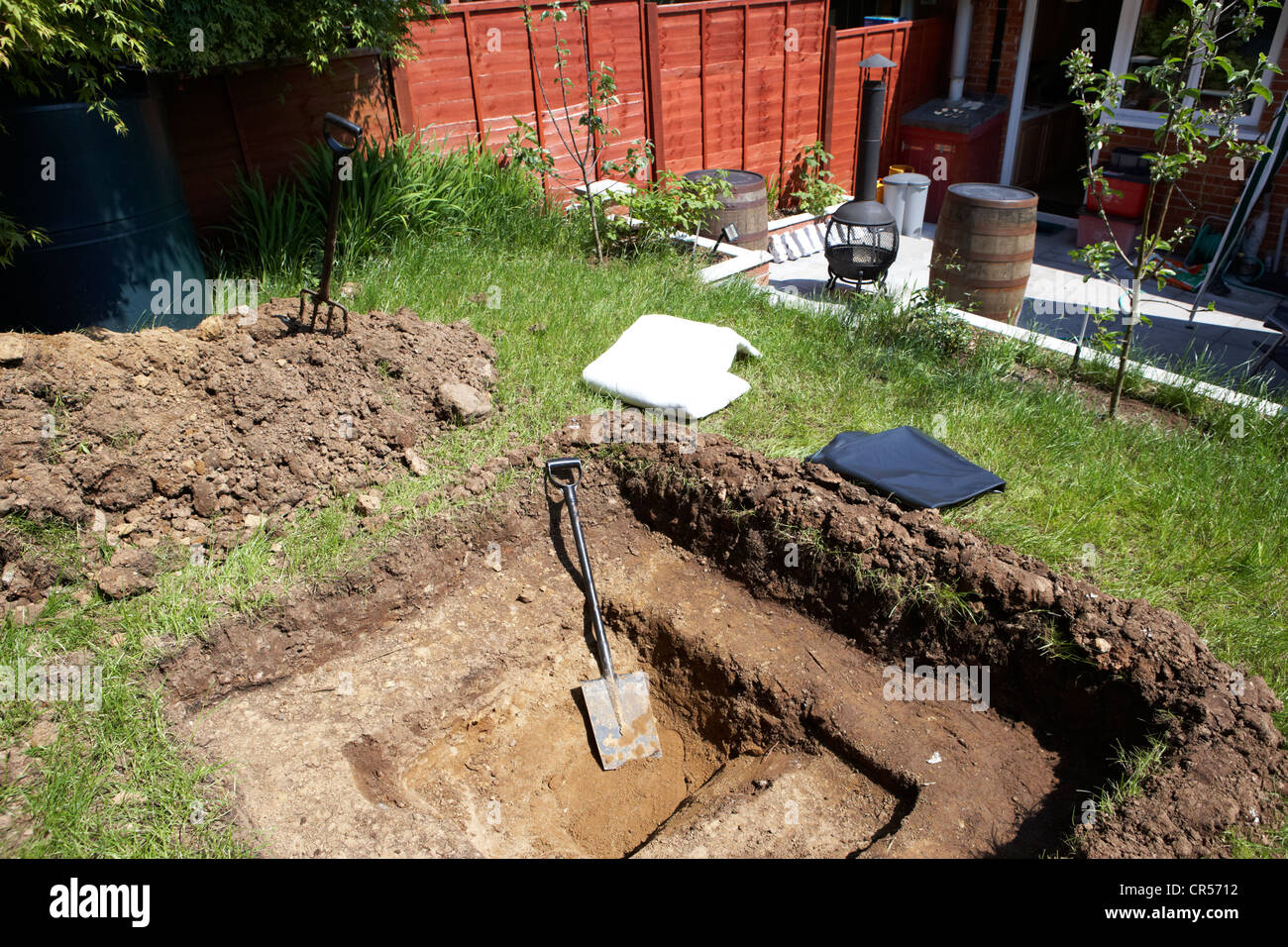 Digging a garden pond High Resolution Stock Photography and Images Alamy