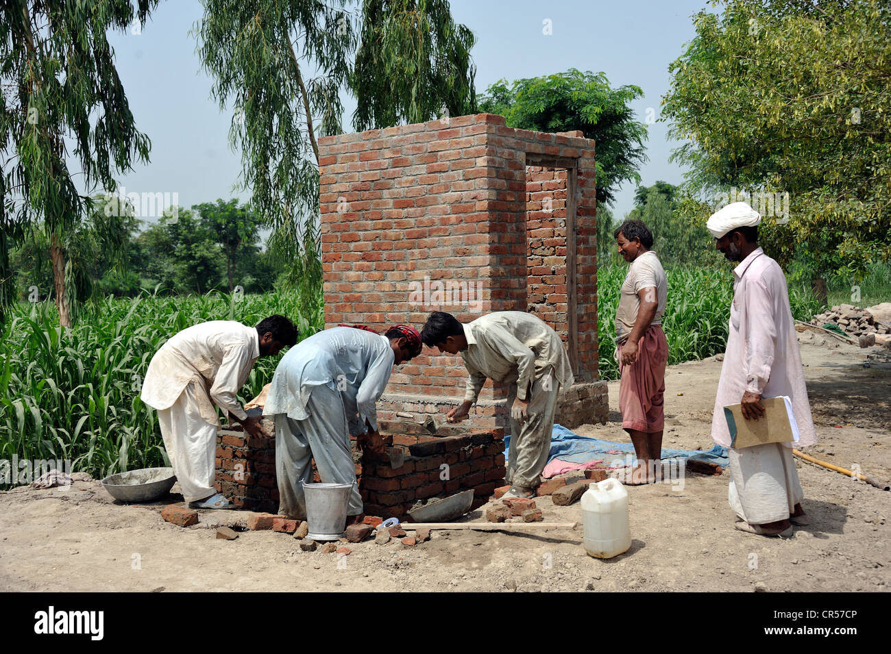 Construction of latrines for victimes of the flood catastrophe of 2010, Lashari Wala village, Punjab, Pakistan, Asia Stock Photo
