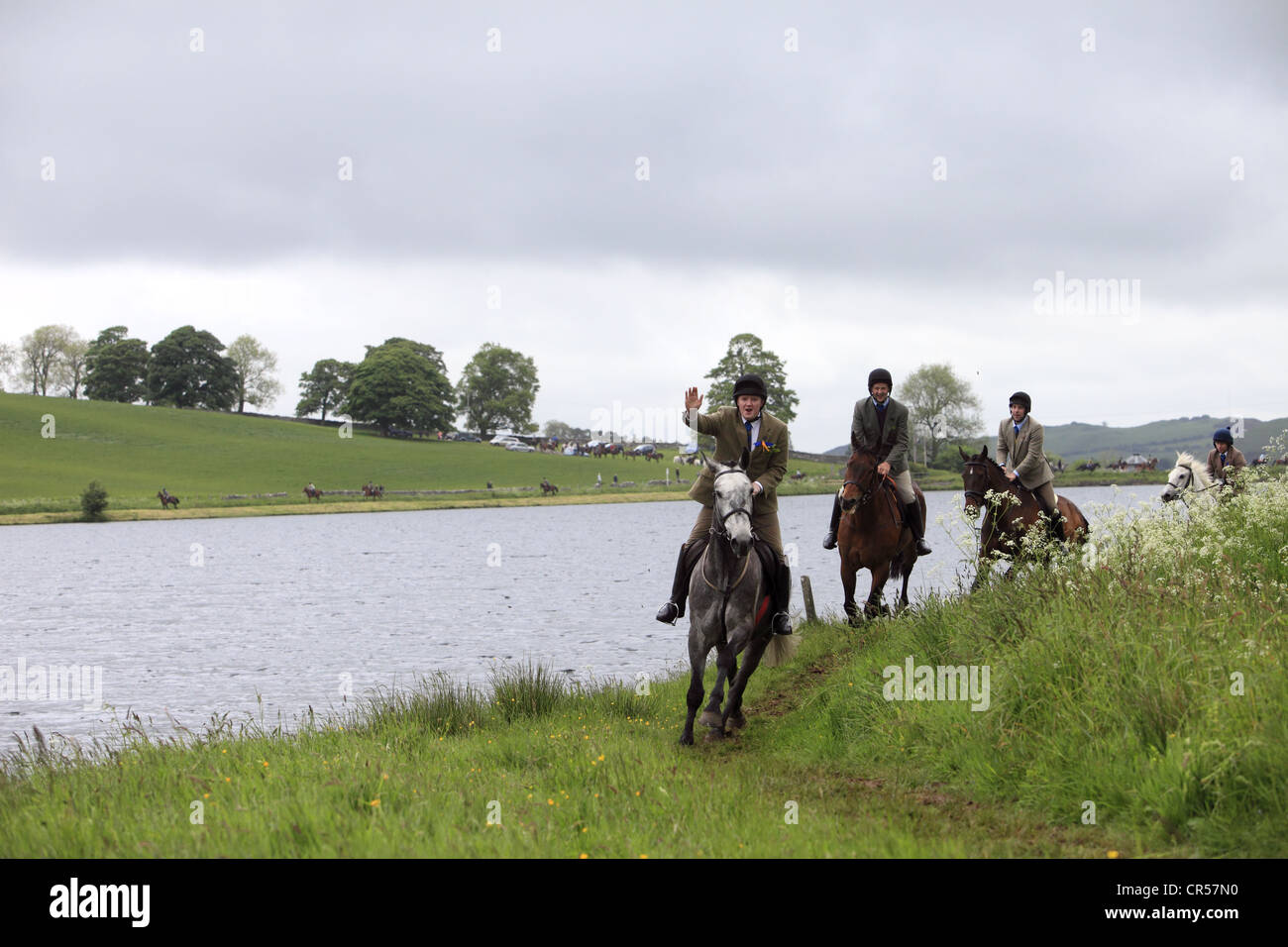 The supporters ride the outlying marches during Hawick CommonRiding in the border town