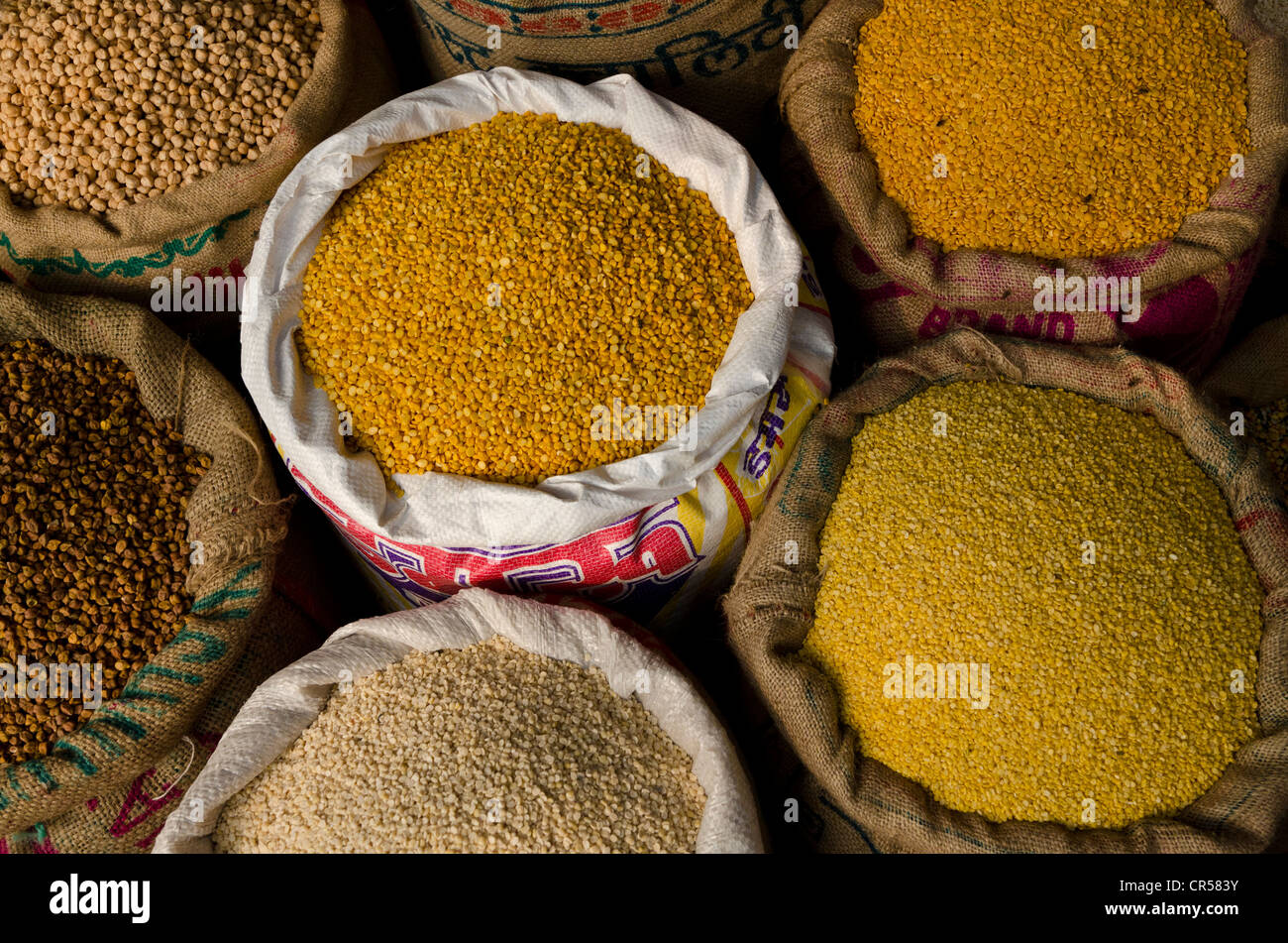 Moong Dhal, Urid Dhal and other types of lentils for sale on the market in the suburb of Paharganj, New Delhi, India, Asia Stock Photo