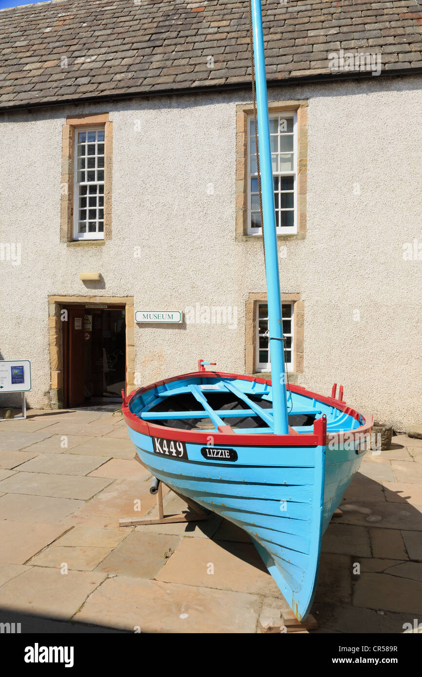 Boat by the front entrance to Orkney Museum in Tankerness House, Broad Street, Kirkwall, Orkney Islands, Scotland, UK, Britain Stock Photo