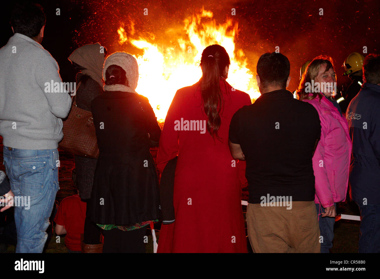 Spectators watch the Jubilee Beacon on Coombe Hill overlooking Chequers