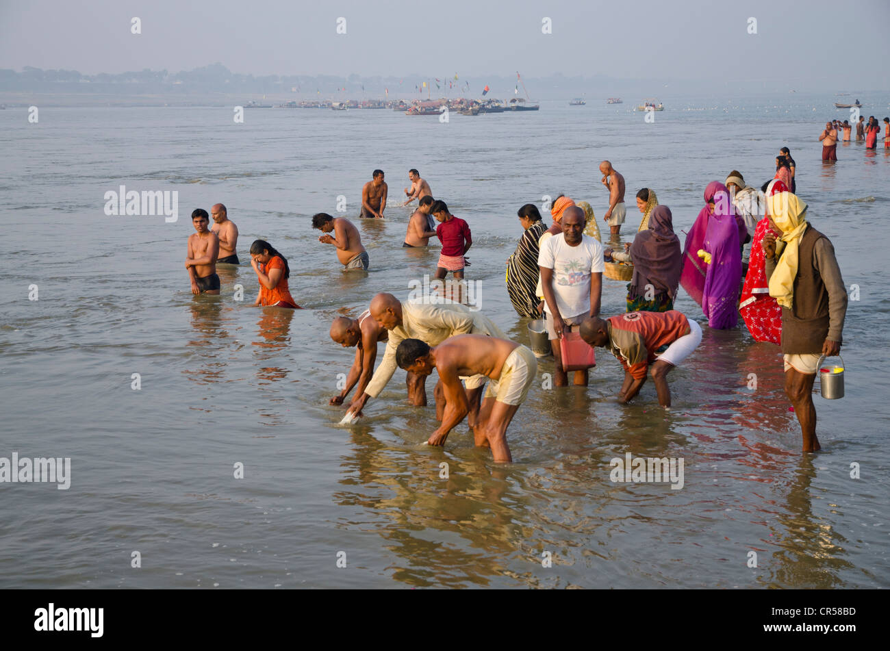 The Sangam, the confluence of the holy rivers Ganges, Yamuna and Saraswati, in Allahabad, busy with pilgrims, , India, Asia Stock Photo