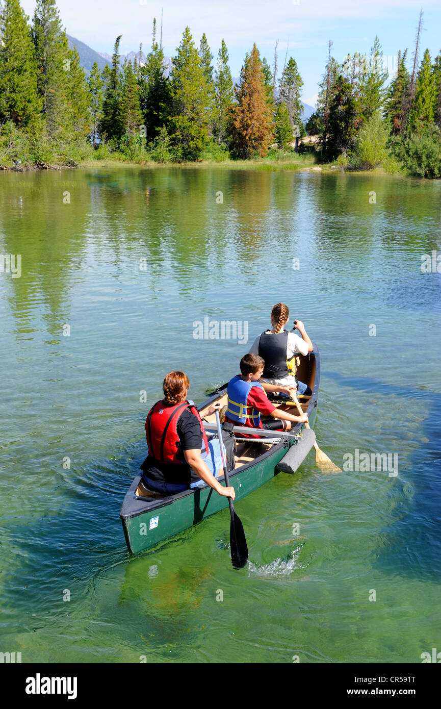 Family Canoeing Jenny Lake Grand Teton National Park Wyoming WY United