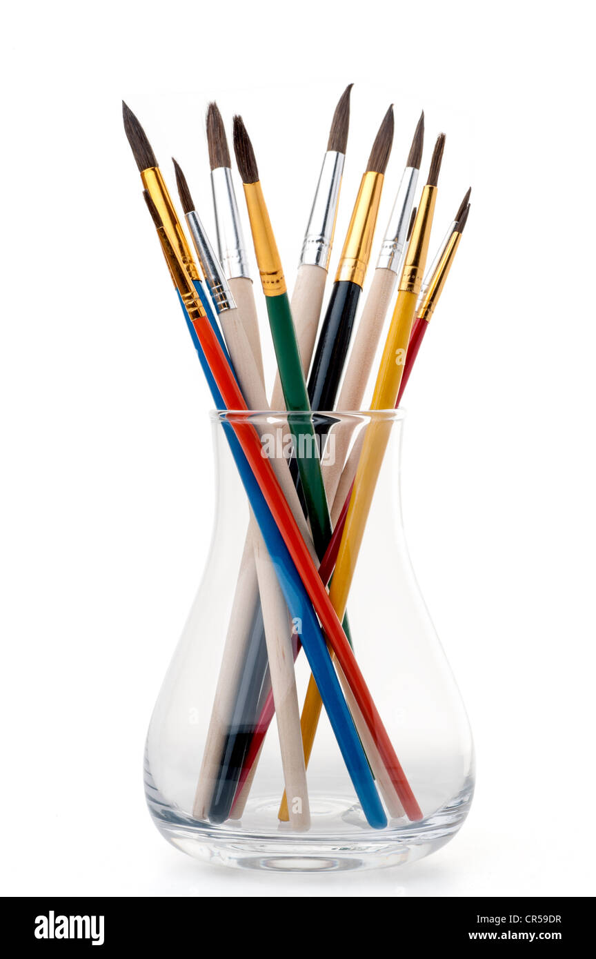 Group of paintbrushes in a glass jar Stock Photo Alamy