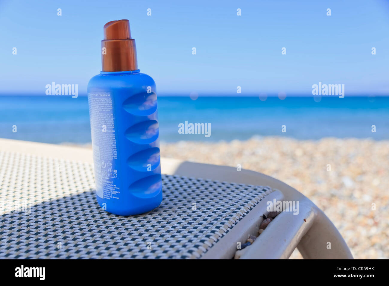 Sun lotion on a sunbed Stock Photo Alamy