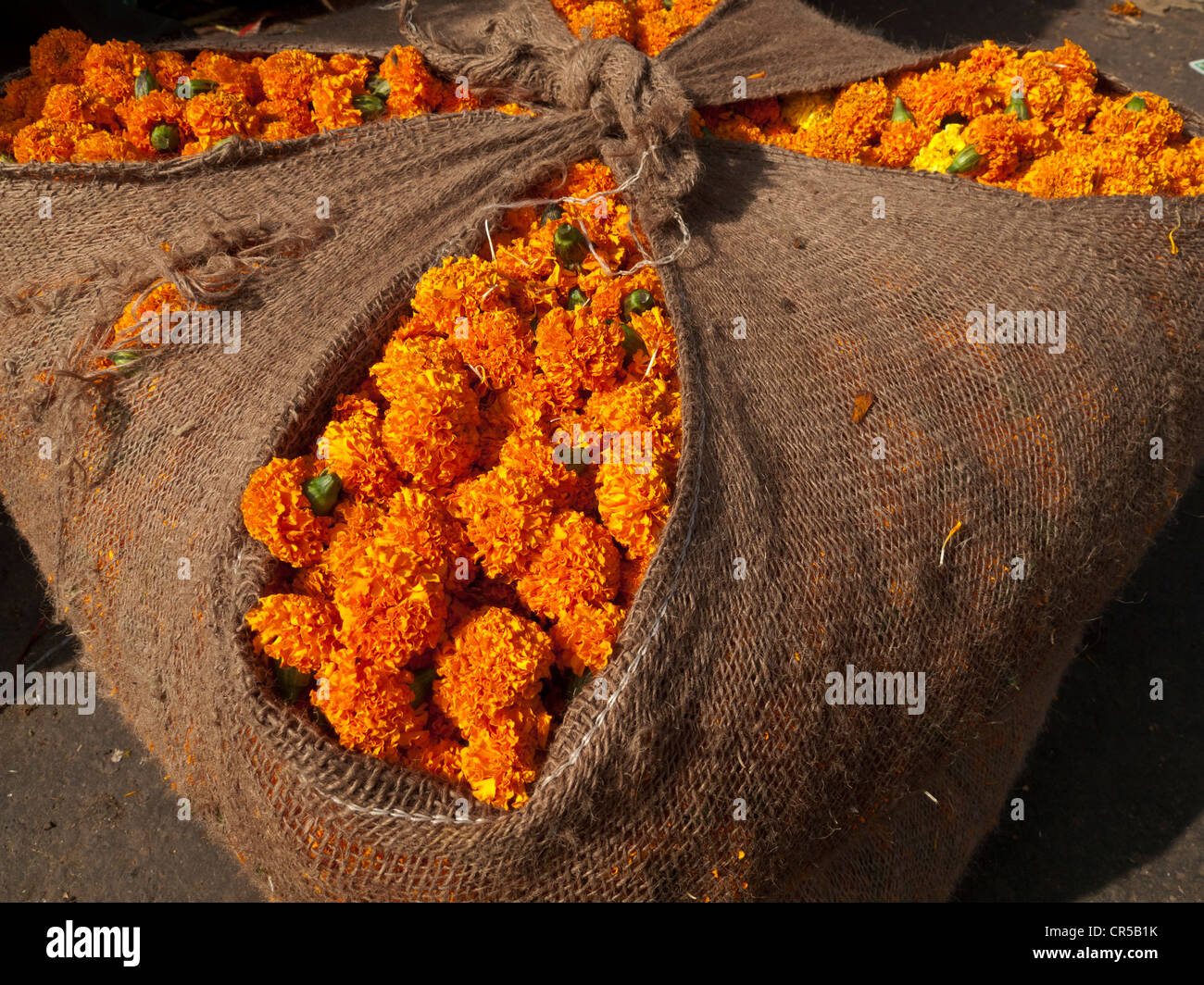 Flowers, sold at the flower wholesale market in Old Delhi, are used for