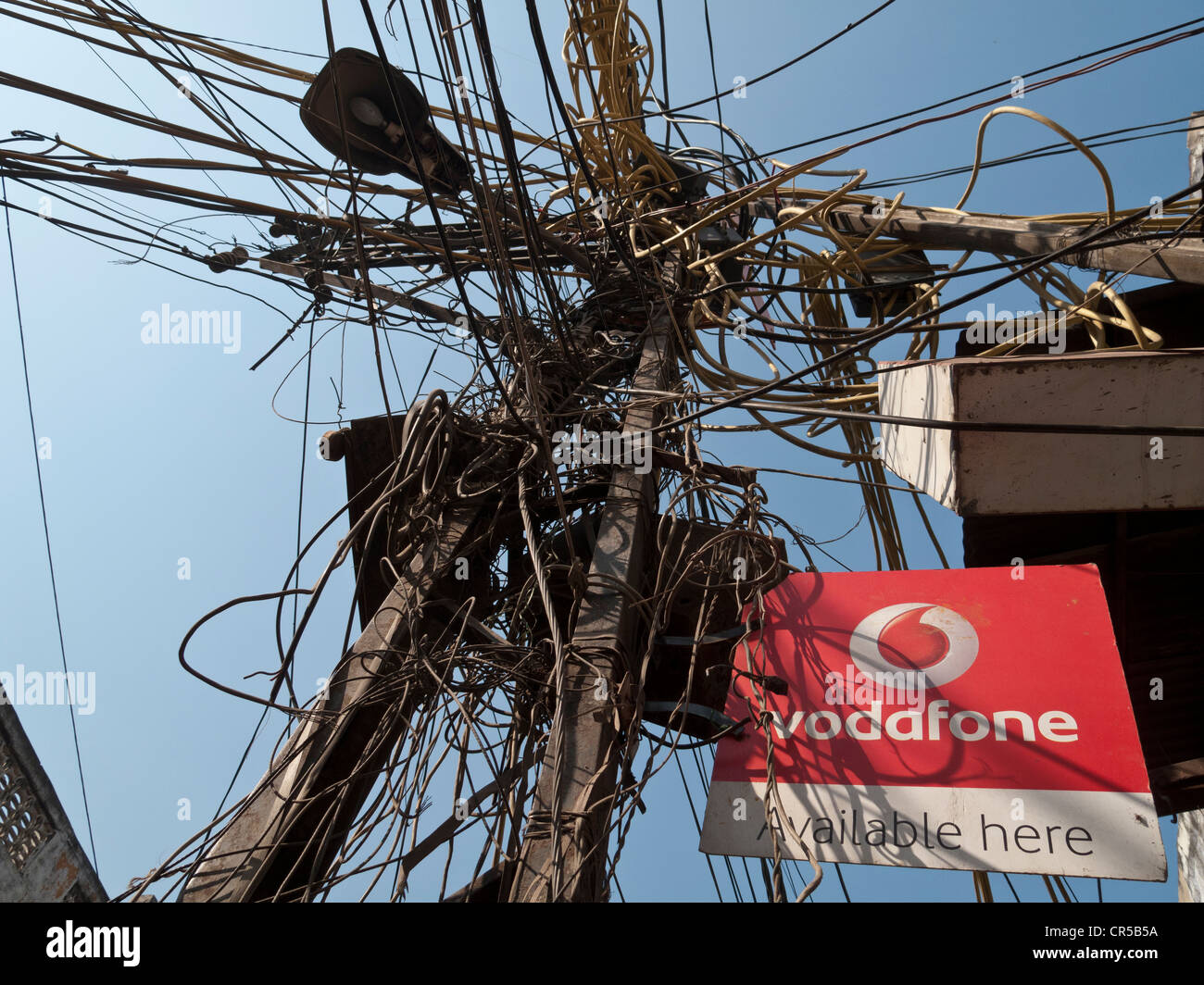 Chaos in the support system of electricity in the streets of New Delhi, India, Asia Stock Photo