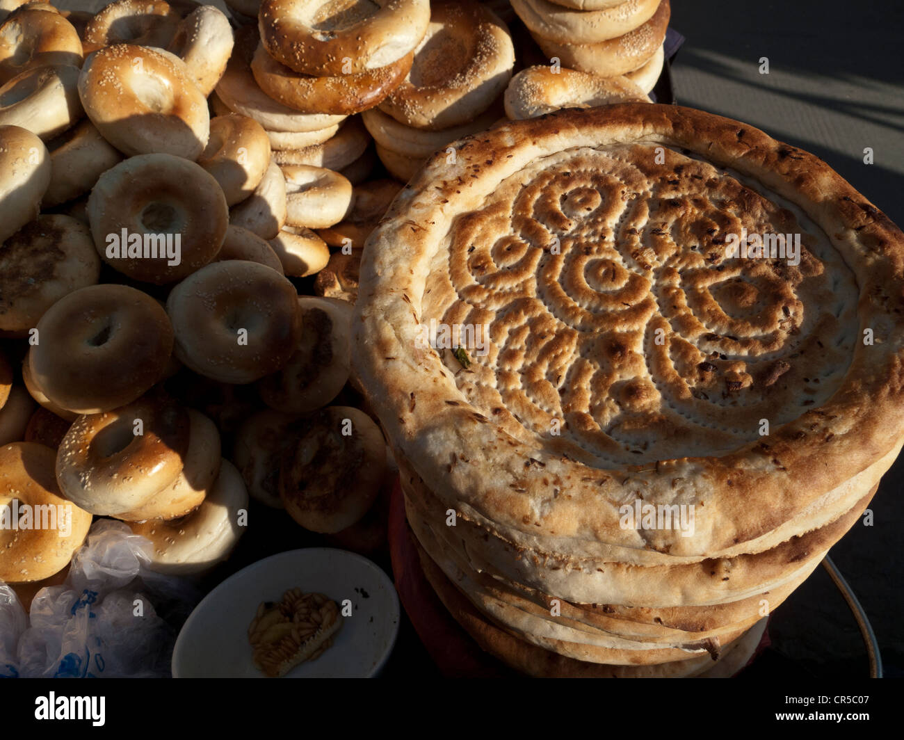 Uigur bread, made in the tandoori oven and sold in the streets of Kashgar, Xinjiang, China, Asia Stock Photo
