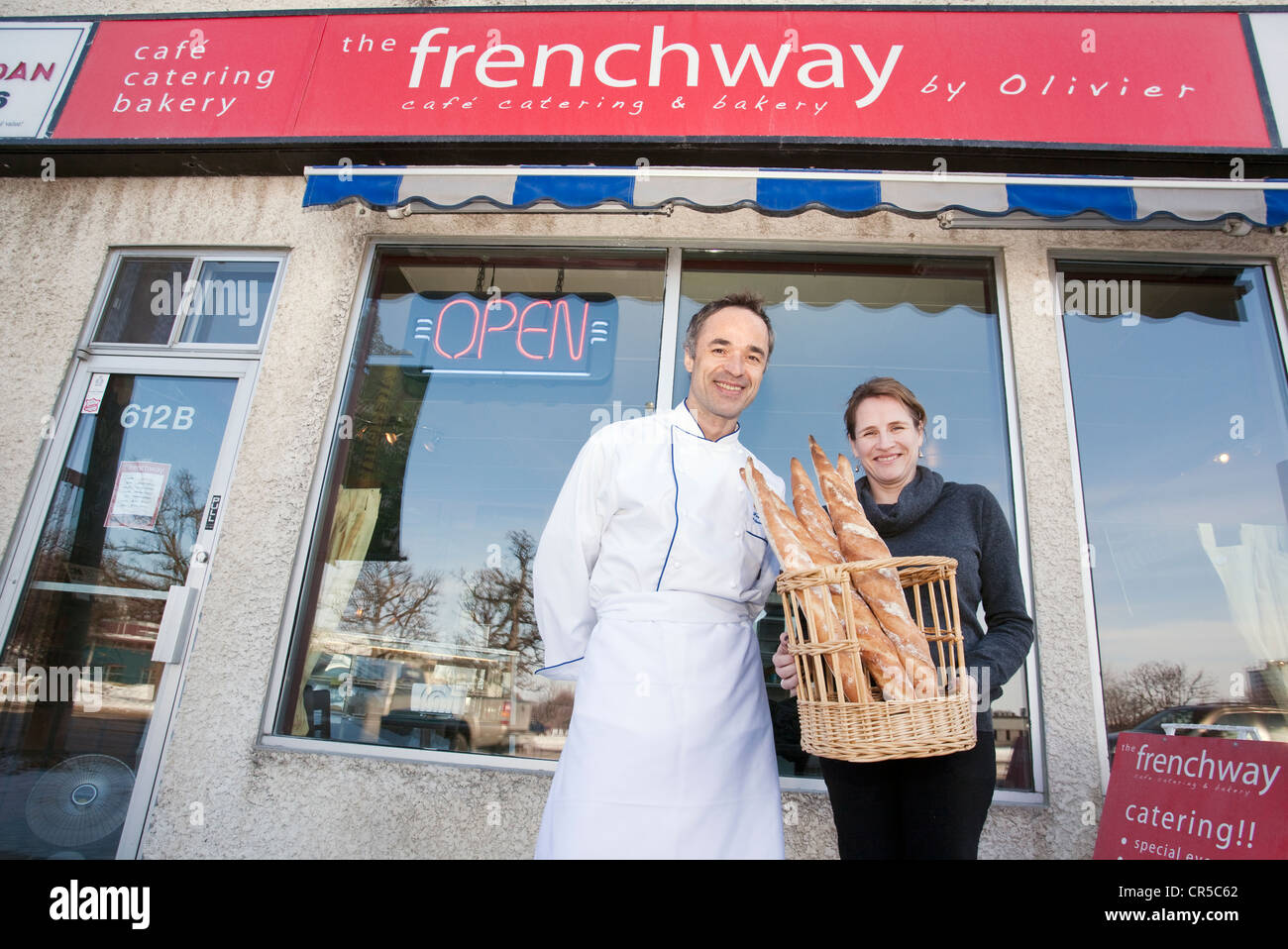 Canada Manitoba Province Winnipeg French people of Manitoba Province Olivier Fortat Larissa Webster in front of their bakery Stock Photo