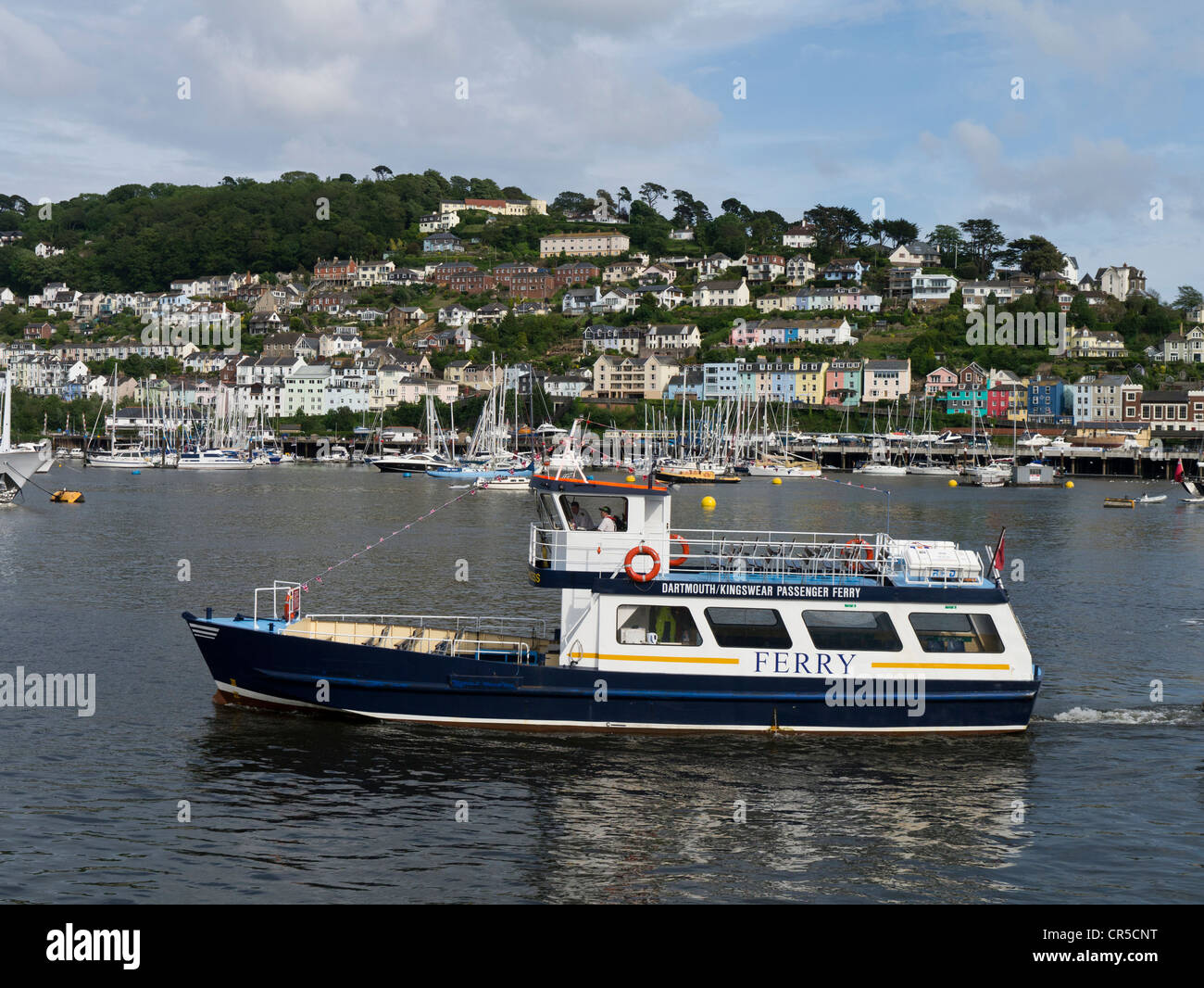 The Dartmouth To Kingswear Passenger Ferry runs upstream on the River Dart in Devon England. Stock Photo