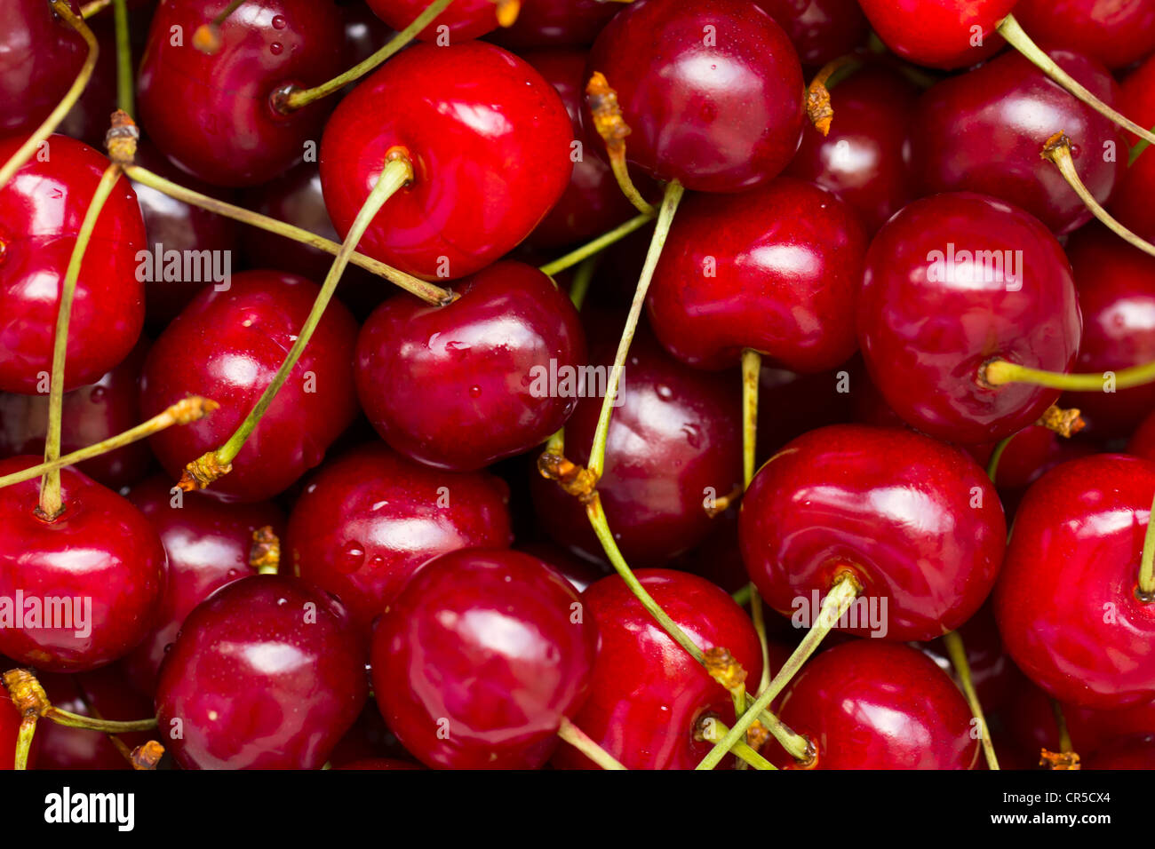 Charry Image Cherries as background close up Stock Photo - Alamy