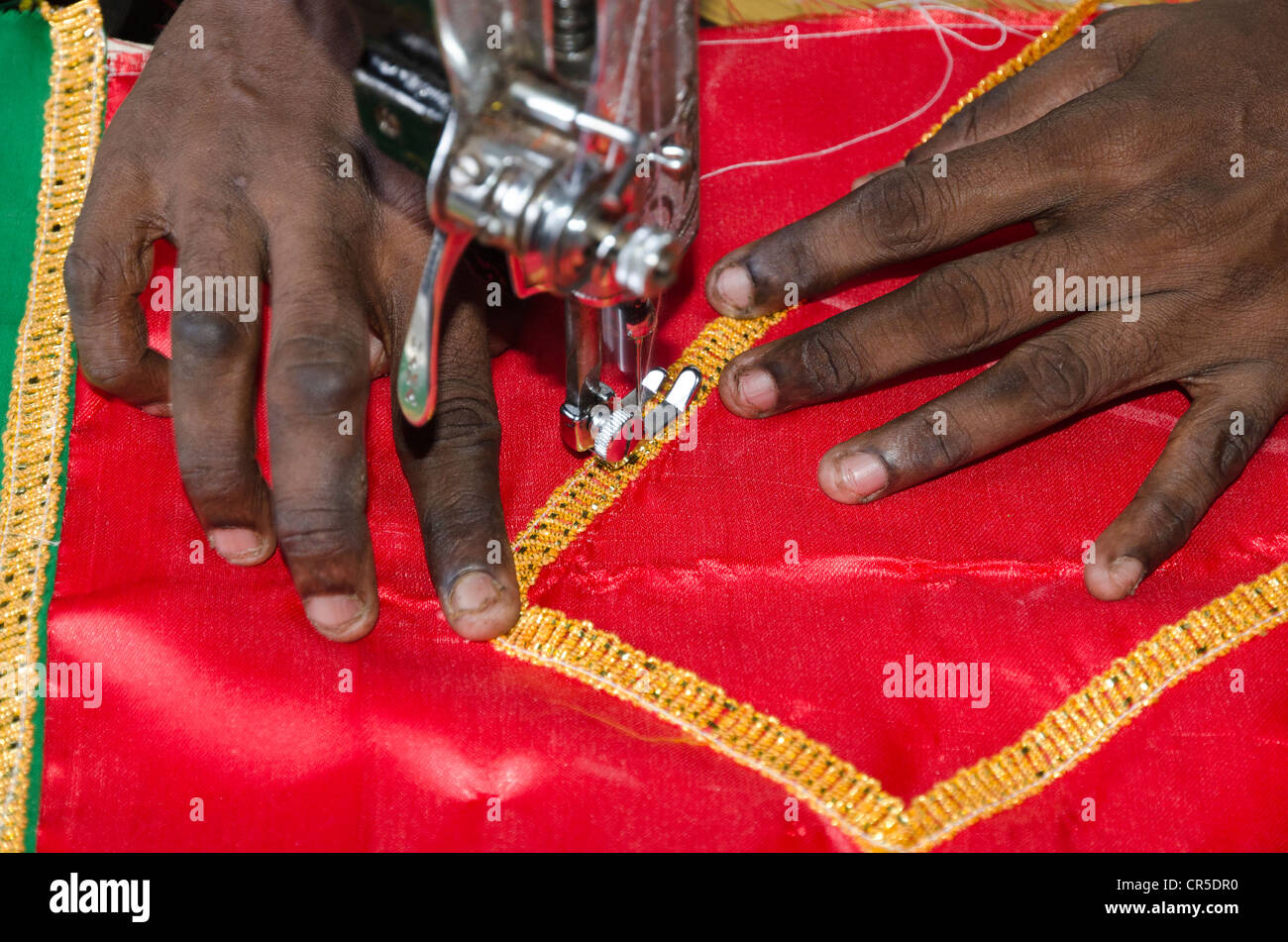 Tailor sewing with sewing machine, Madurai, Tamil Nadu, India, Asia