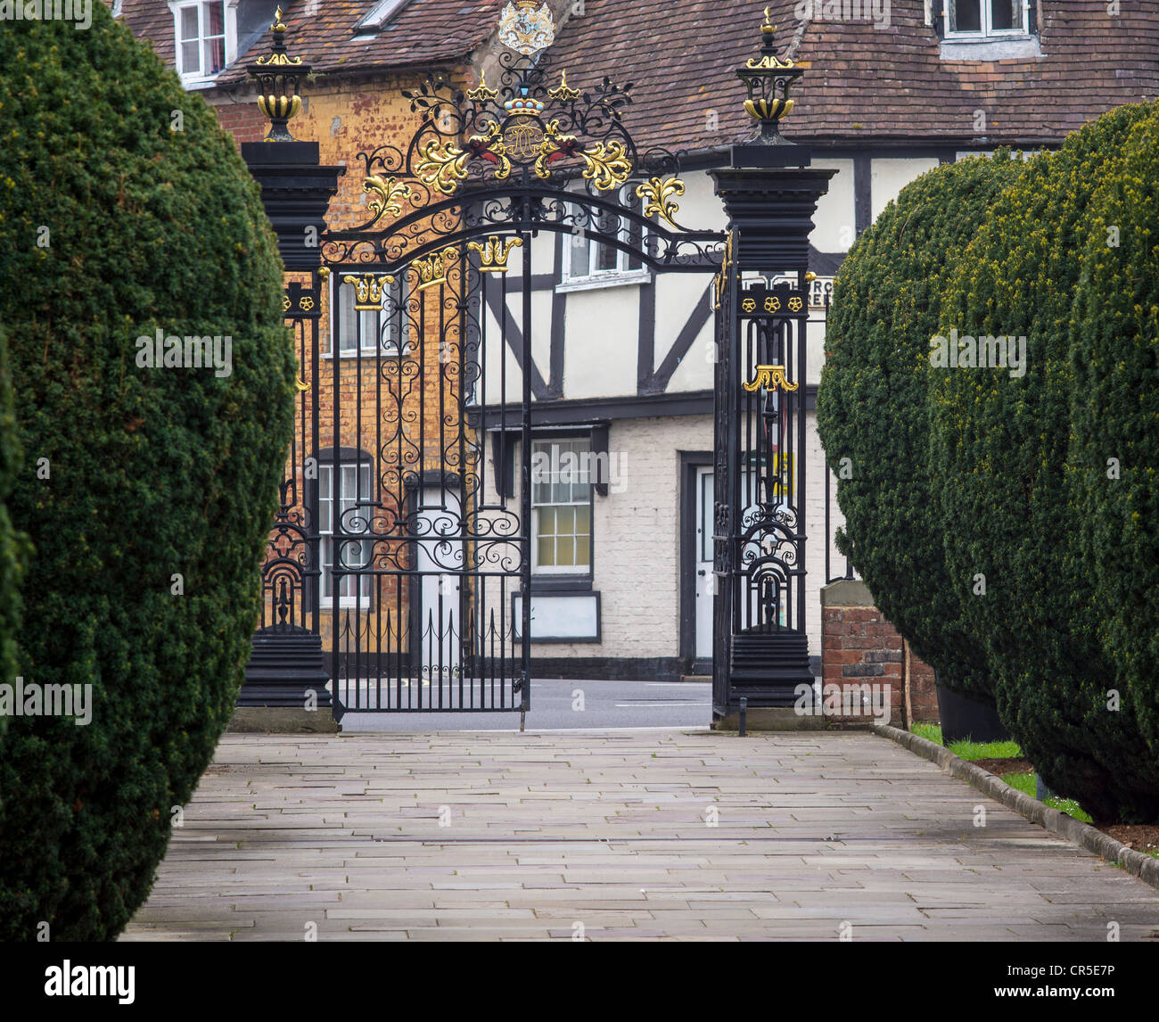 The Ornamental wrought iron gates at the North Entrance to Tewkesbury Abbey, Gloucestershire, England, UK. Stock Photo