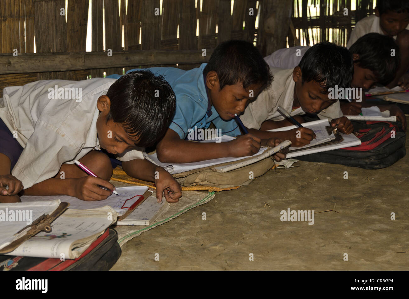 Children in the government school in Borbil still study on the floor, India, Asia Stock Photo