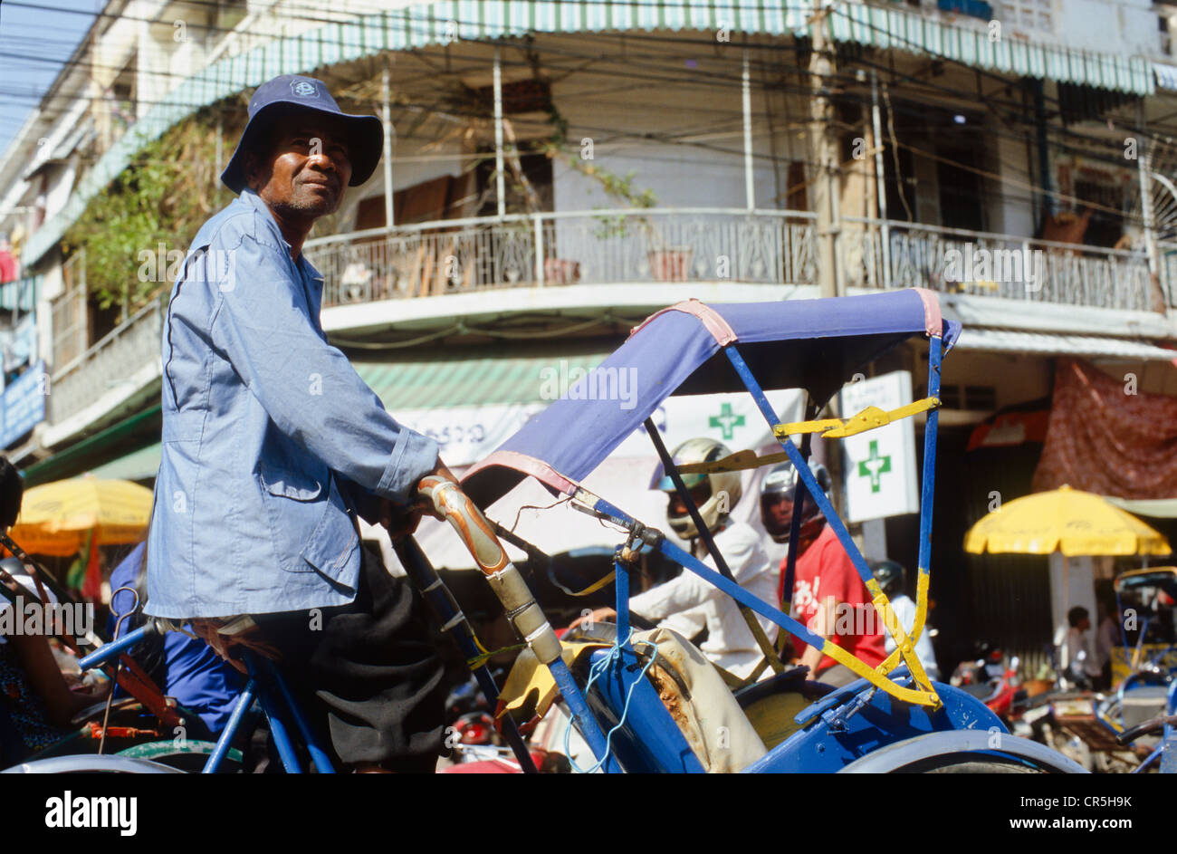 Cyclo rickshaw in Pnom Penh, Cambodia, Southeast Asia Stock Photo
