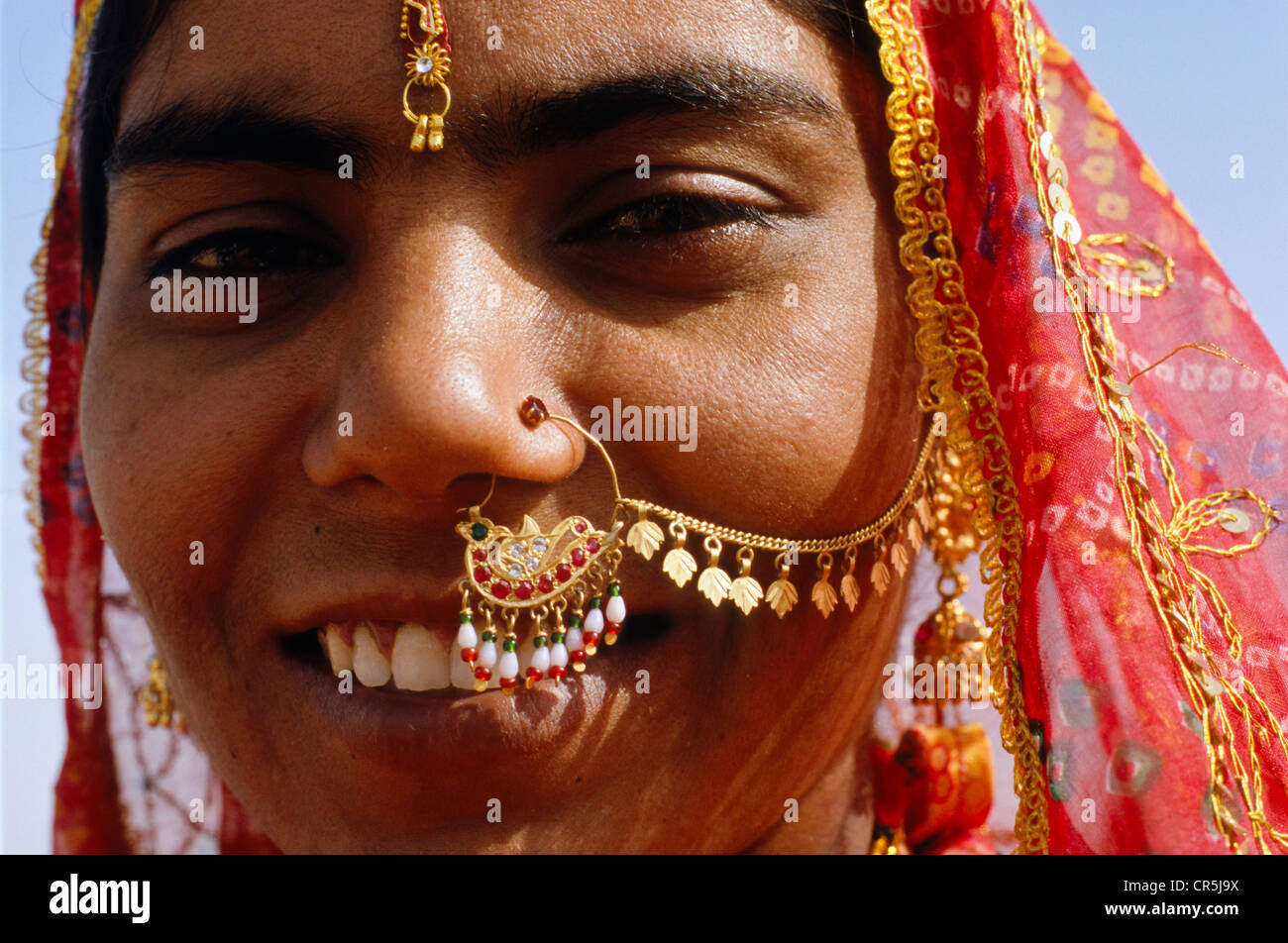 Indian woman with jewellery worn for special occasions like weddings, Jaisalmer, Rajasthan, India, Asia Stock Photo