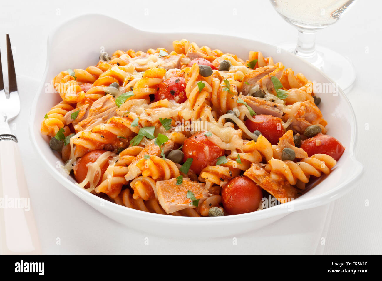 Fusili pasta baked with tuna, cherry tomatoes, marinara, capers and