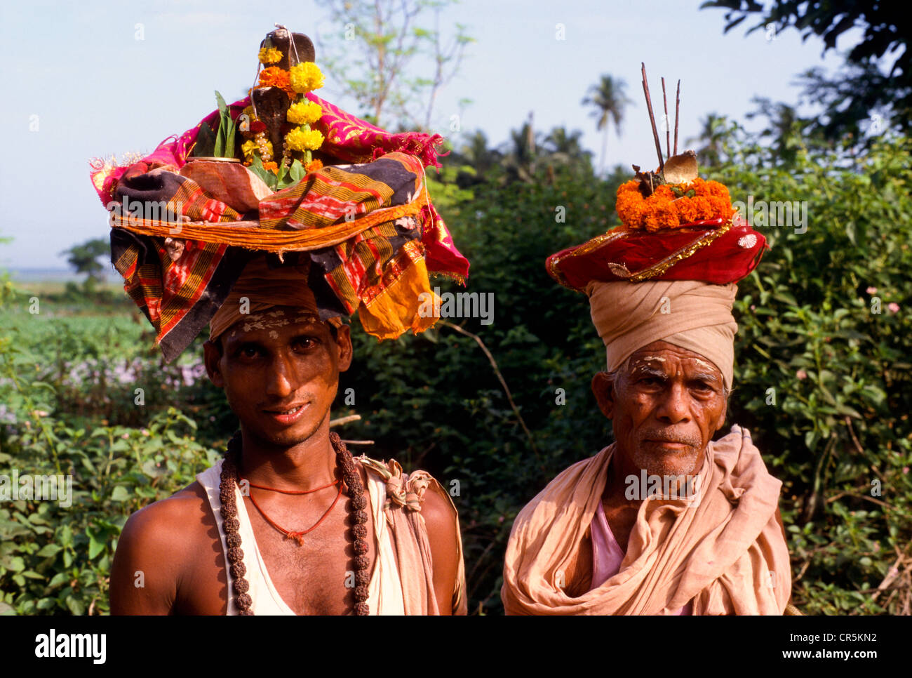 Wandering priests offering pooja to the local people, Puri, Orissa, India, Asia Stock Photo