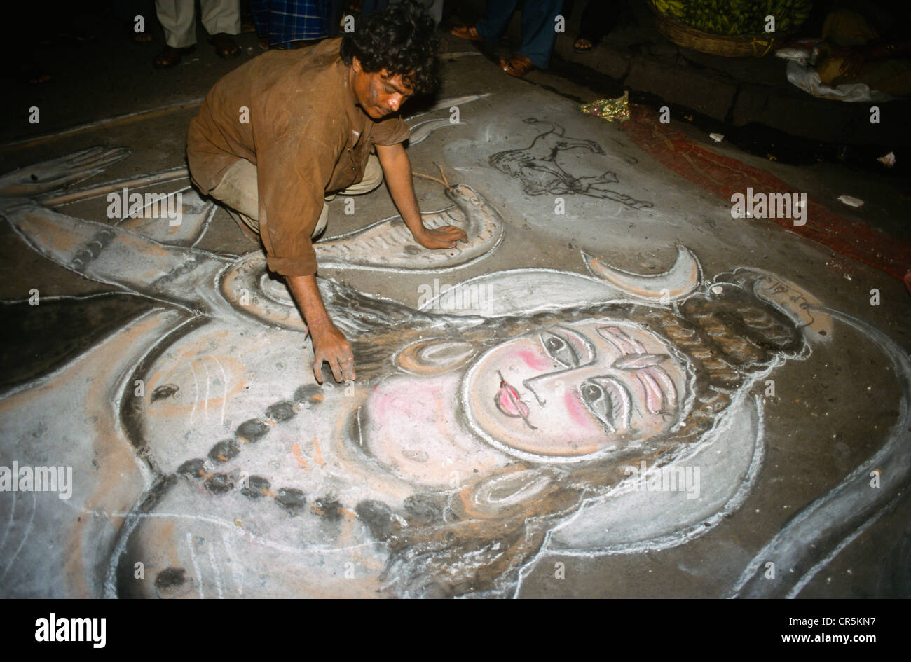 Street artist creating a shiva image on the pavement, Kolkata, West Bengal, India, Asia Stock Photo