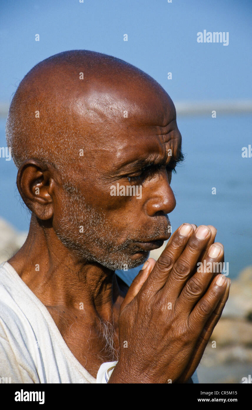 Praying man, Omkareshwar, Madhya Pradesh, India, Asia Stock Photo