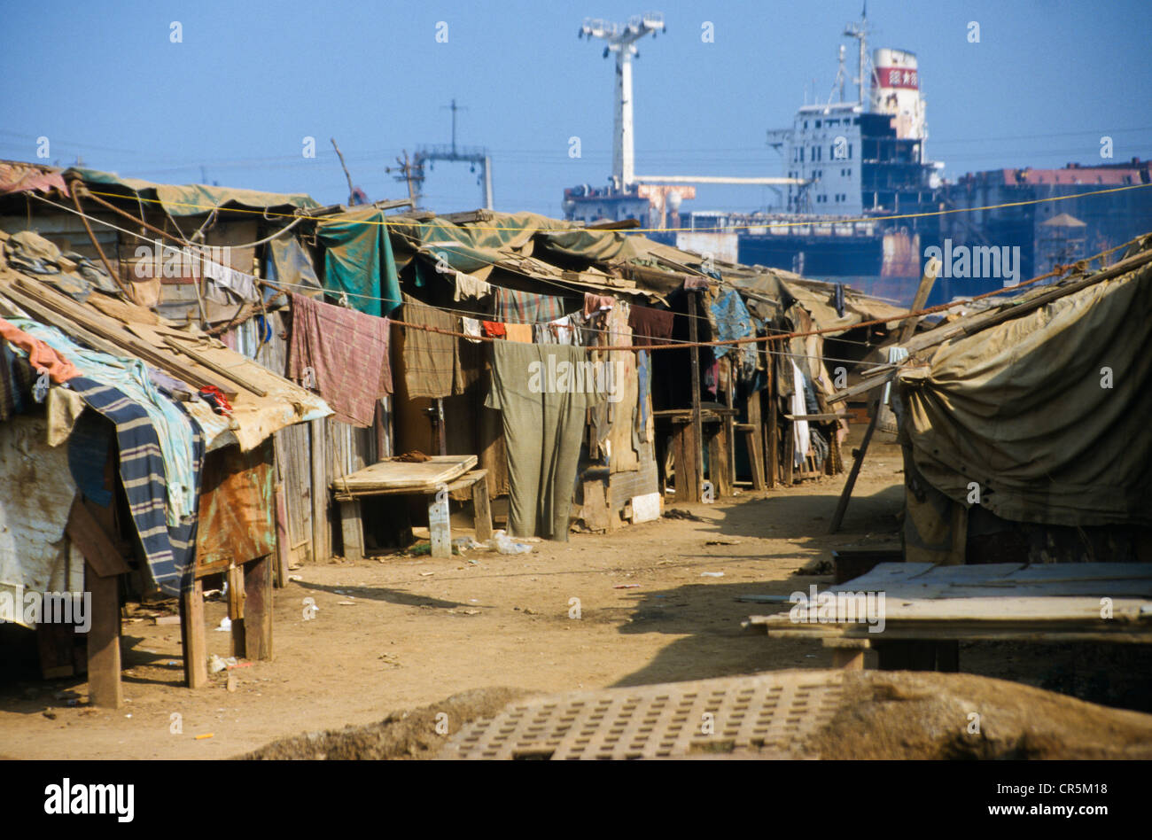 Alang, the largest shipbreaking place on earth, where labourers from the poor areas of India work under horrible conditions Stock Photo