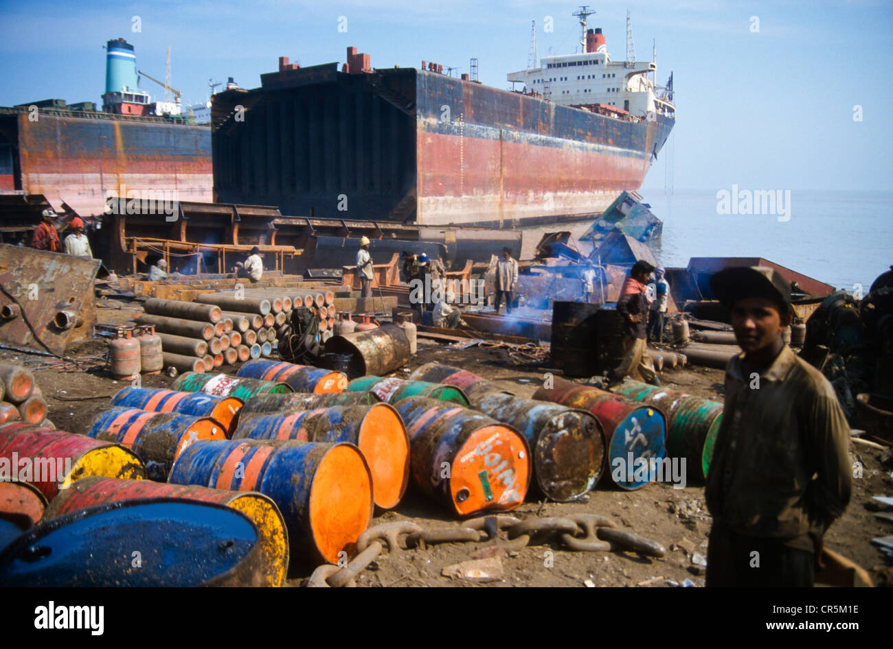Alang, the largest shipbreaking place on earth, where labourers from the poor areas of India work under horrible conditions Stock Photo