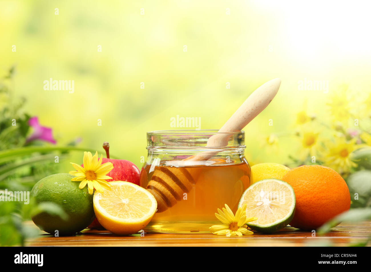 Honey and fresh fruits,closeup. Stock Photo