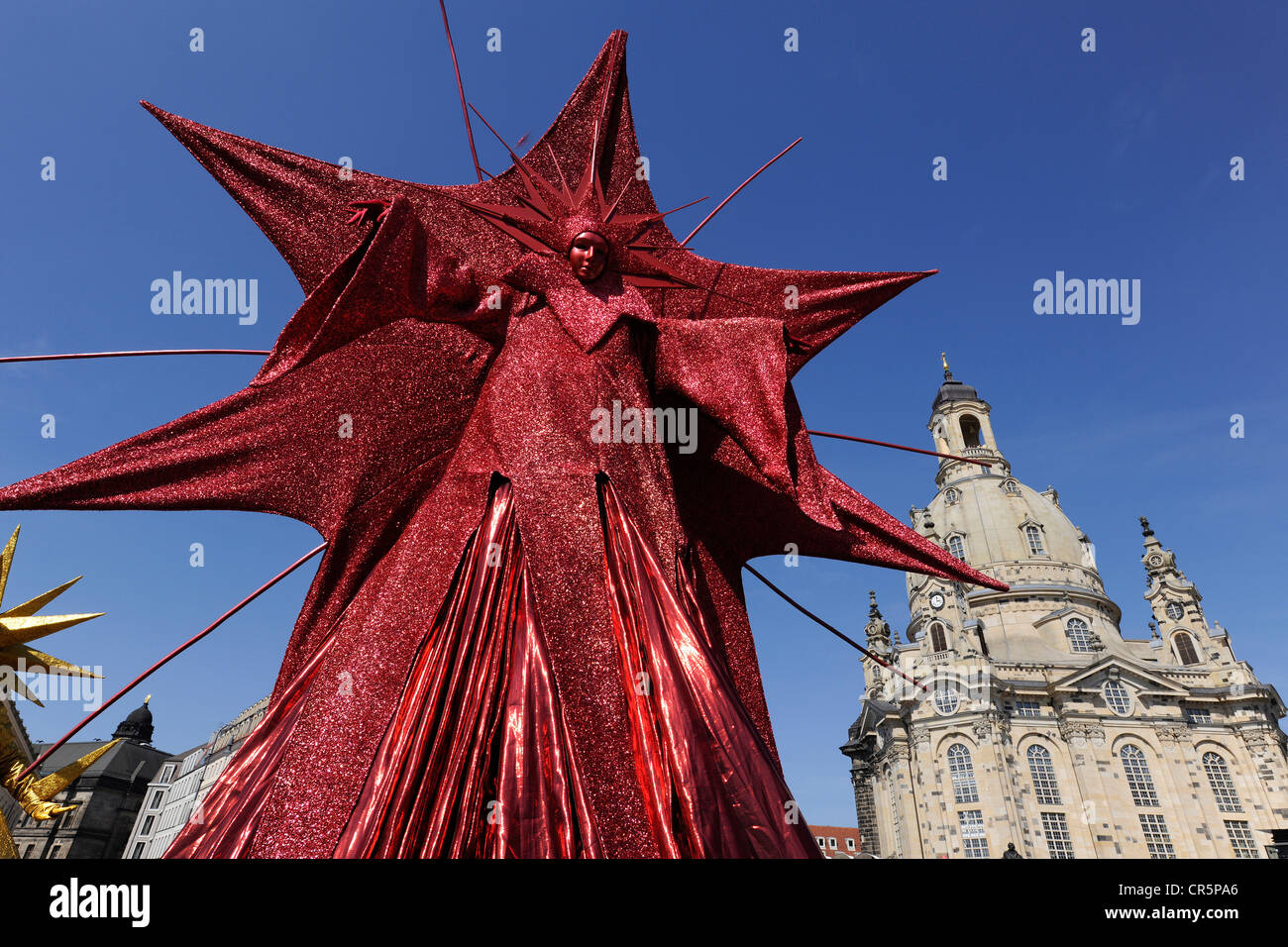 City Festival in Dresden, large red star-shaped figure in front of the Church of Our Lady on Neumarkt square, Saxony Stock Photo