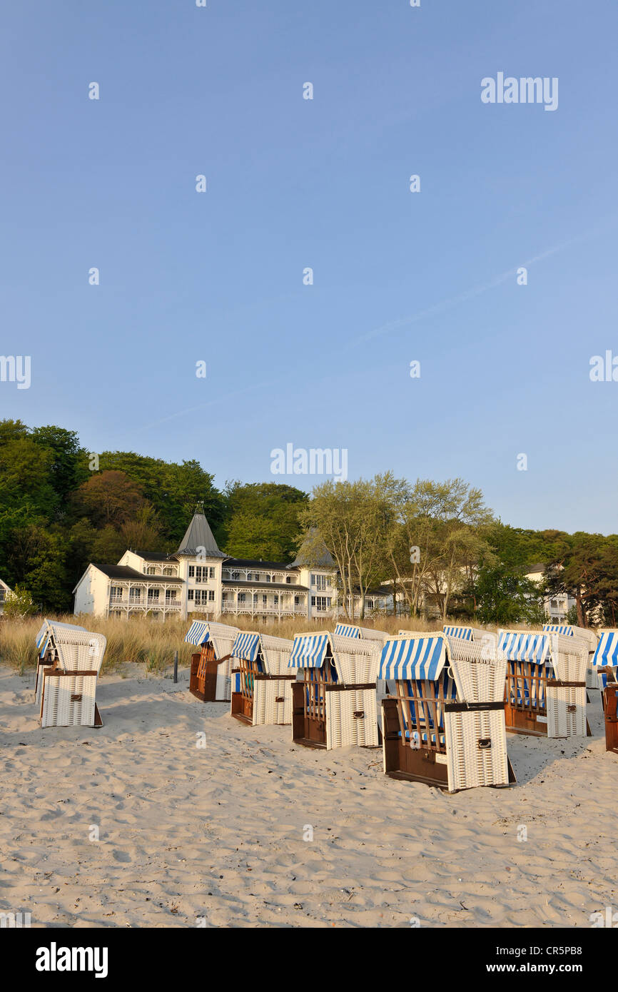 Roofed wicker beach chairs on a beach near Binz, with space in the sky for text, Ruegen, Mecklenburg-Western Pomerania Stock Photo