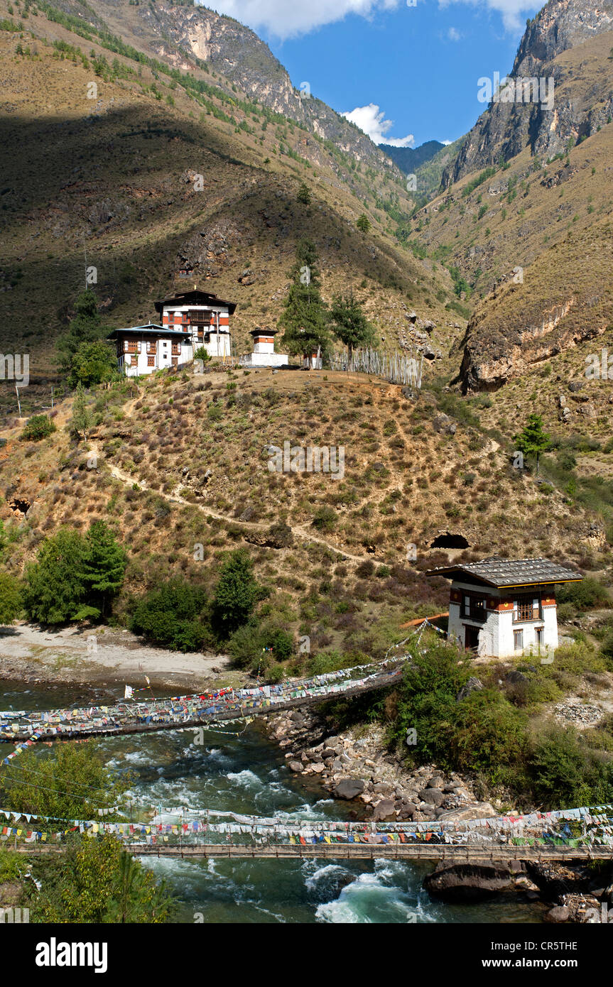 Landscape with a traditional farmhouse along a river near Paro, Bhutan, South Asia, Asia Stock Photo